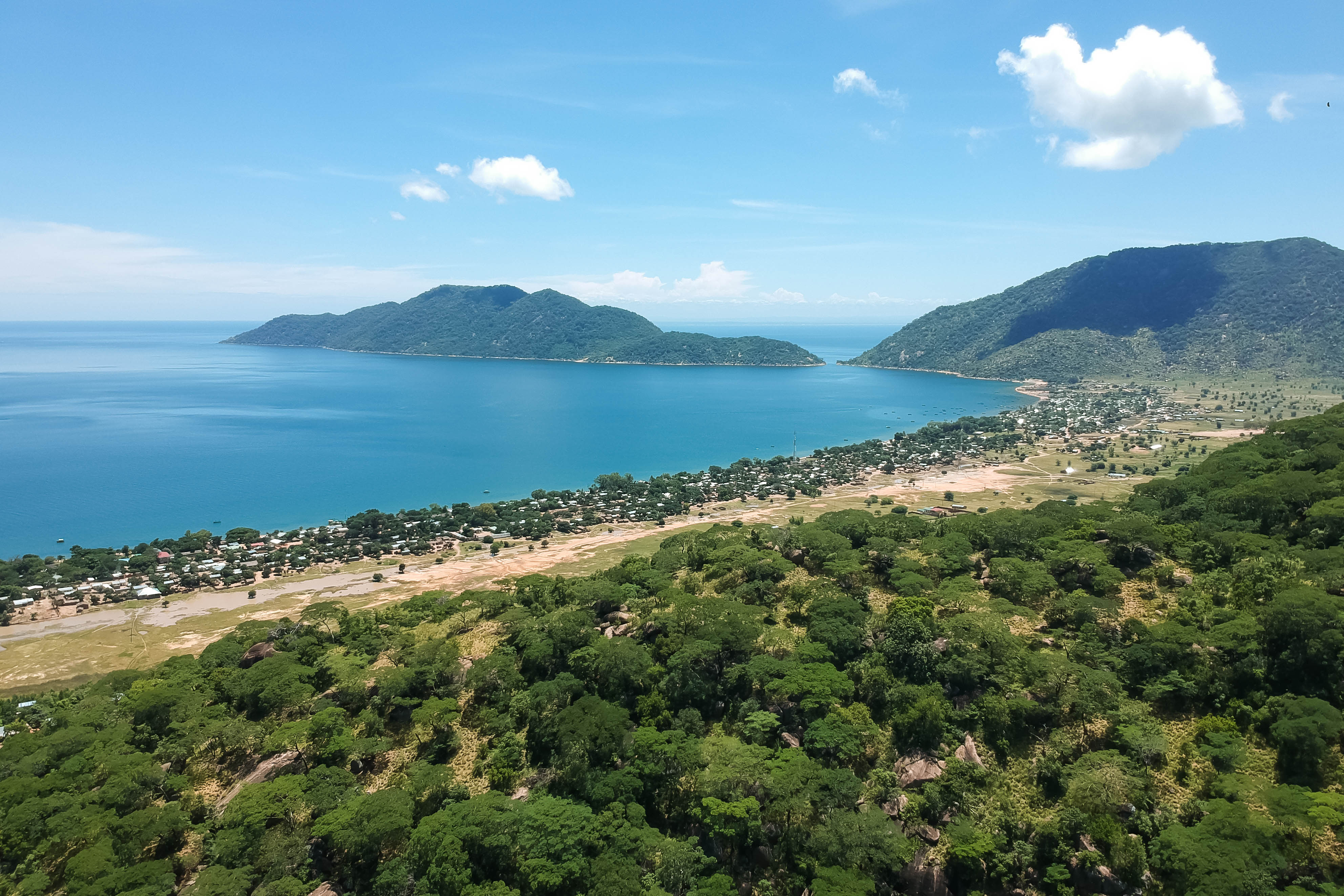 Cape Maclear Kasankha bay with green mountains in the background in Cape Maclear, Malawi