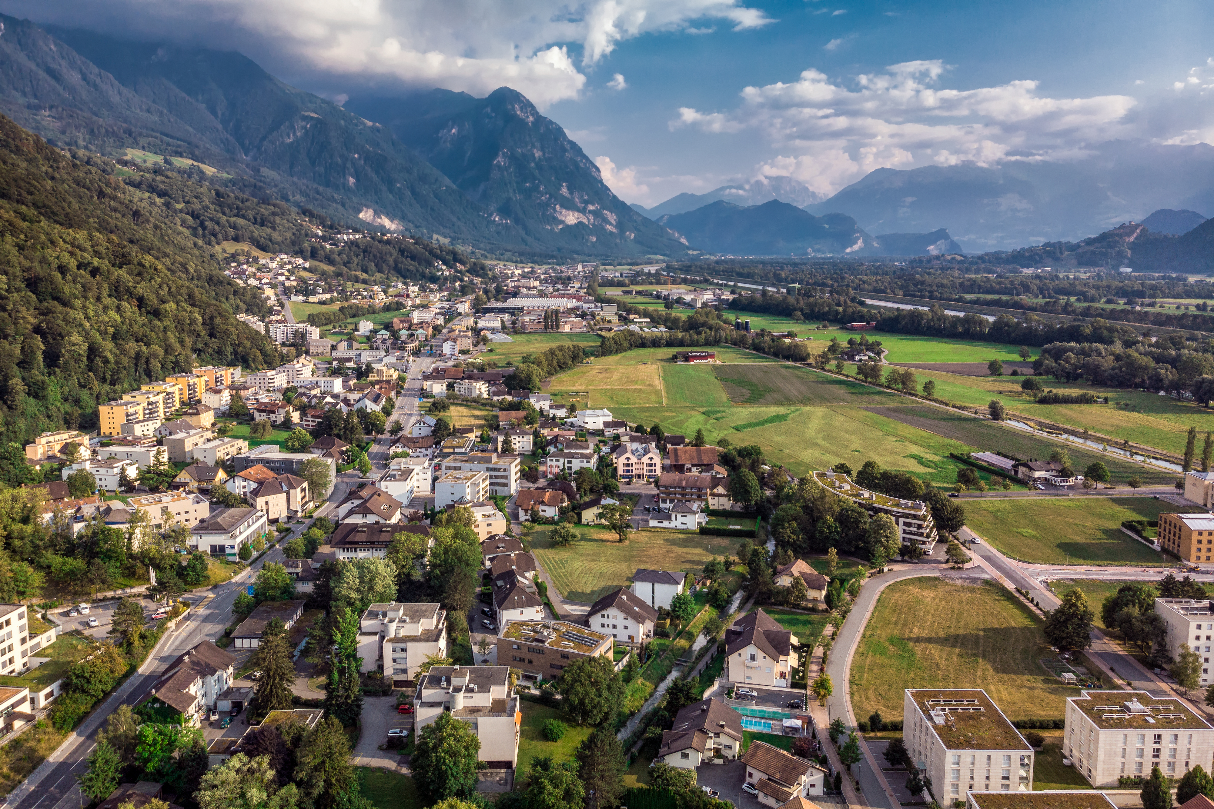 Vaduz town, panoramic view of the capital of Liechtenstein with Alps mountains in background, Europe