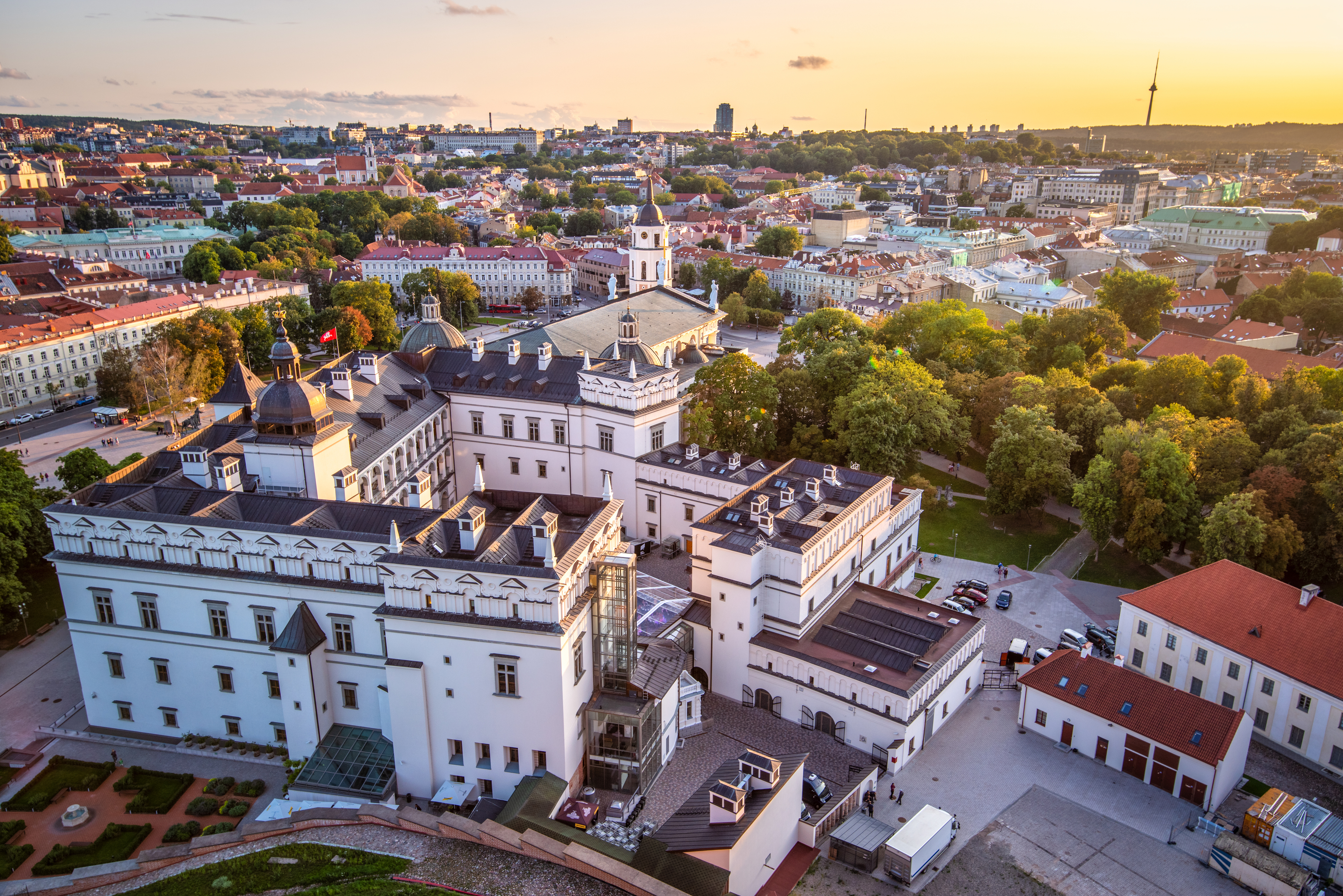 Aerial view from the Gediminas Tower on Vilnius city center with Cathedral Basilica of St Stanislaus, Palace of the Grand Dukes and TV tower at sunset