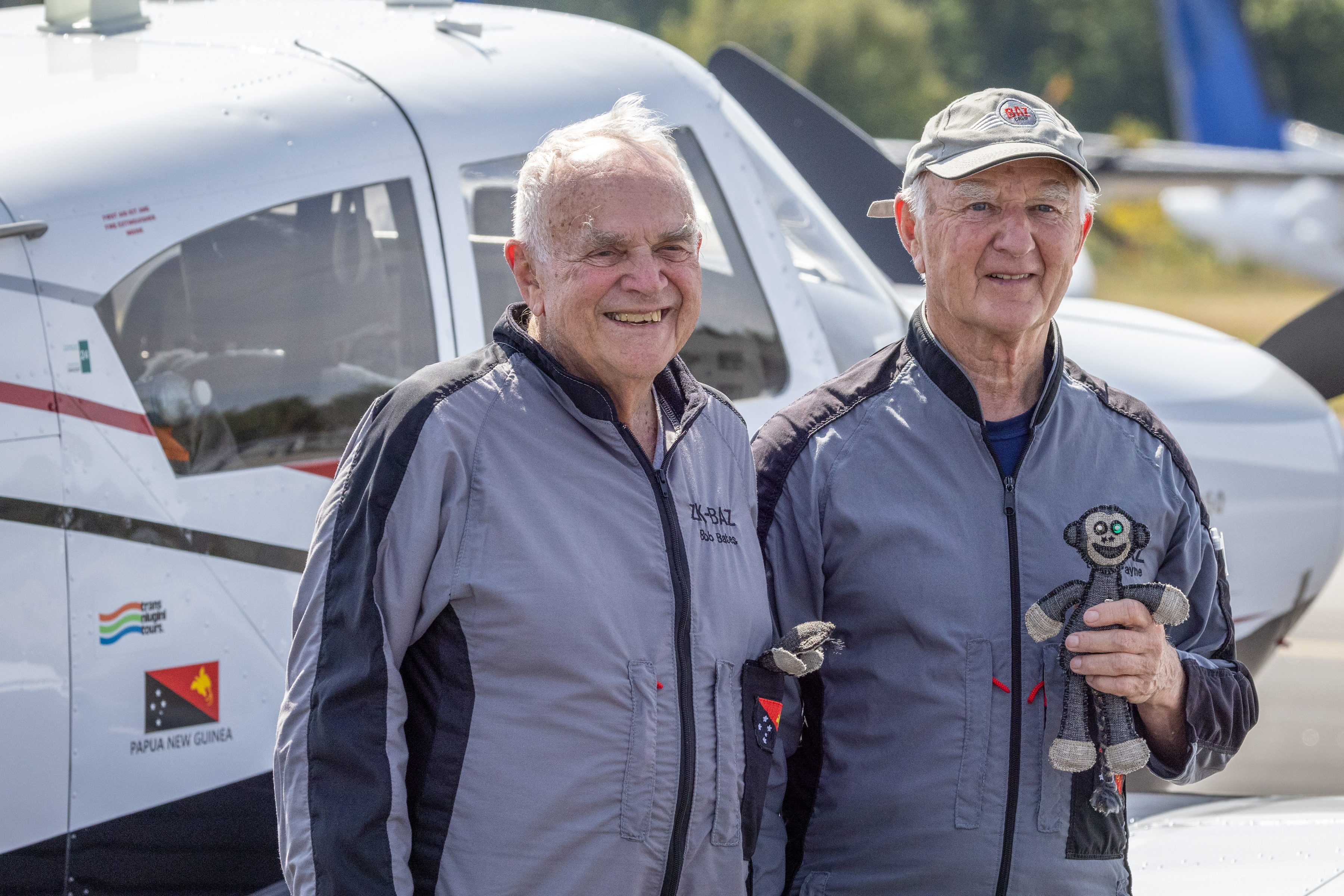 Bob Bates and Barry “Baz” Payne in front of their single-engine monoplane.