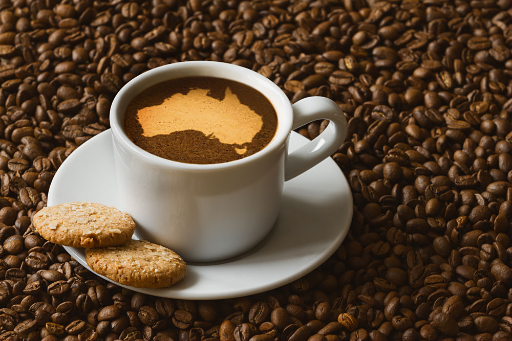 Hot Cup of Coffee with Map of Australia in Foam