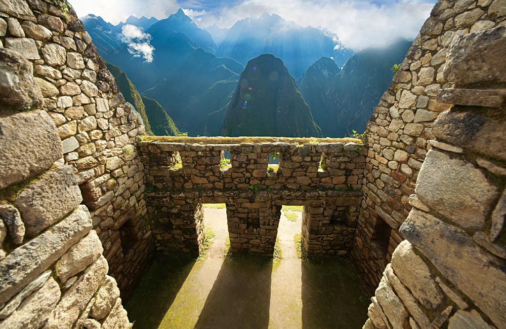 Inca wall in the ancient city of Machu Picchu, Peru