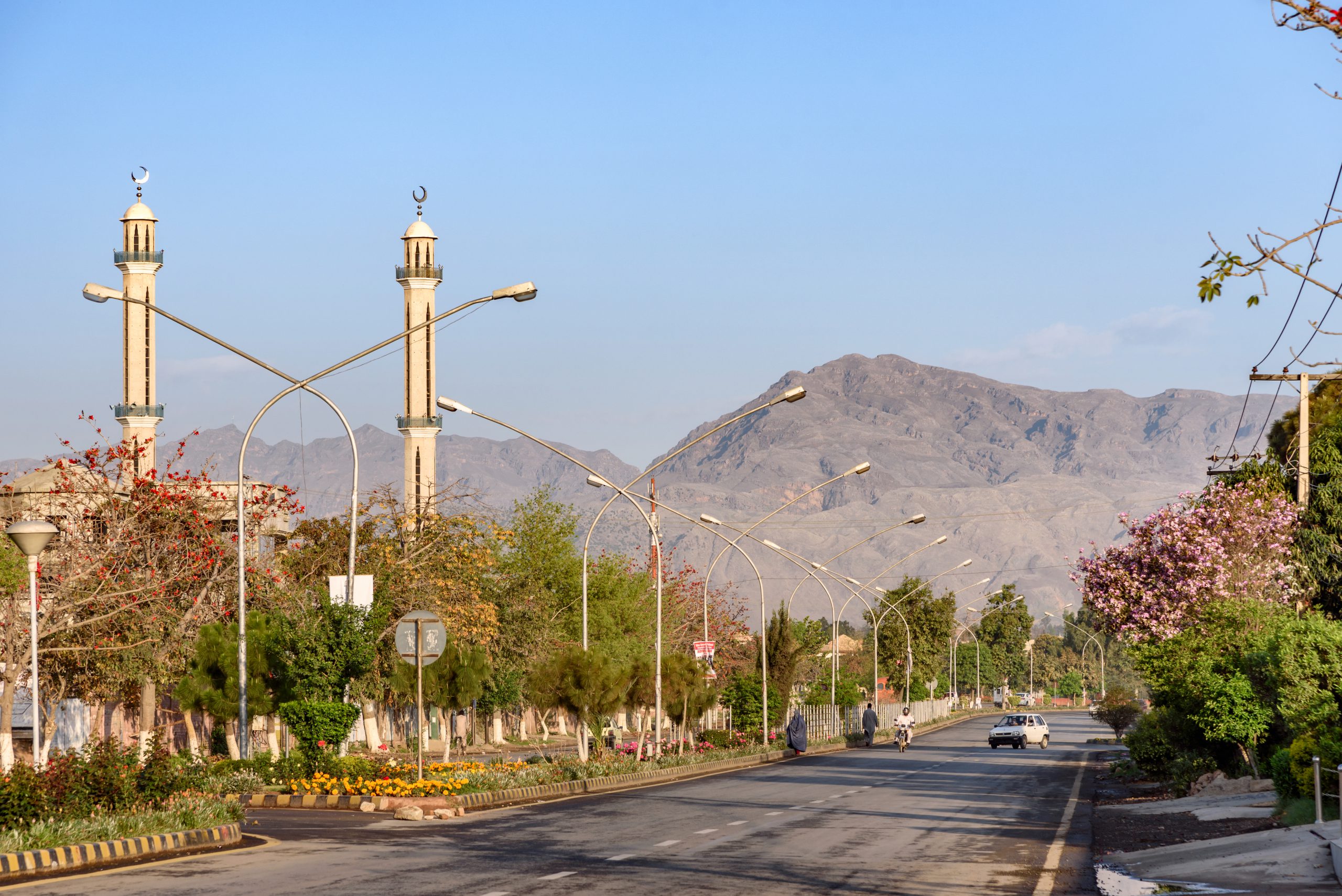 views of a road with mountain in background