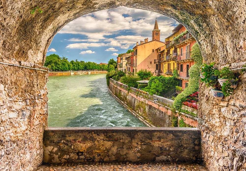 Scenic rock arch balcony overlooking Adige River in central Verona, Italy