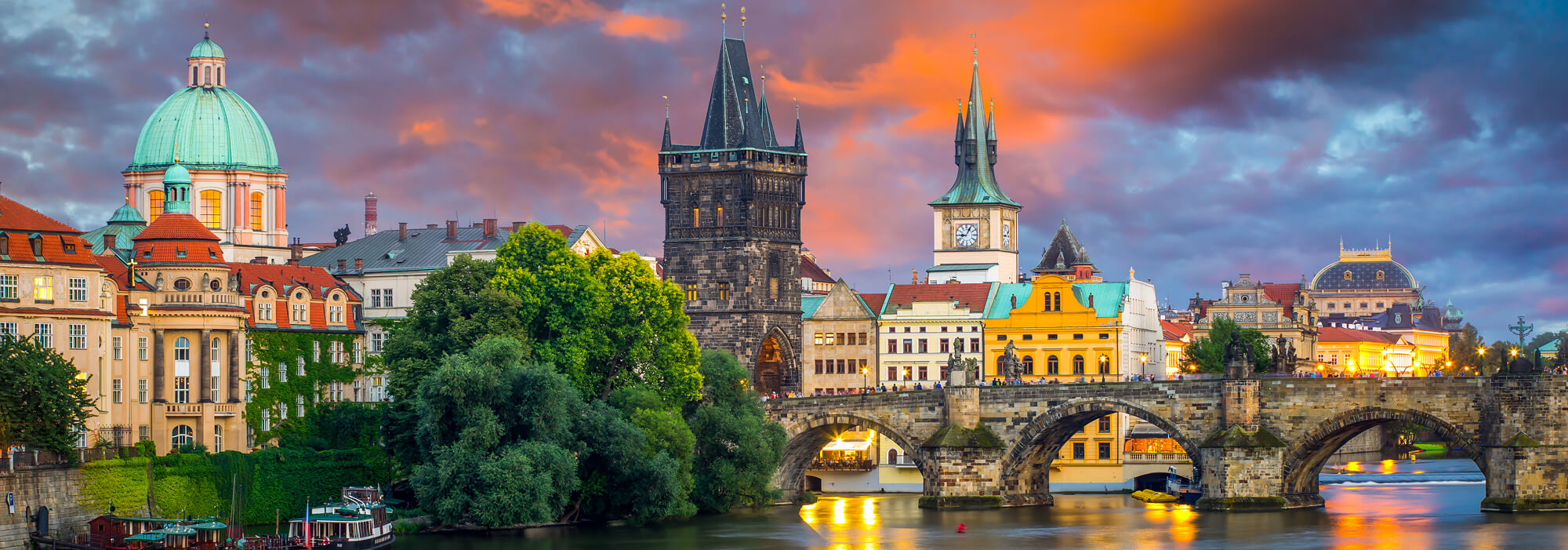 Sunset sky over the River Vltava and Charles Bridge, Prague, Czech Republic