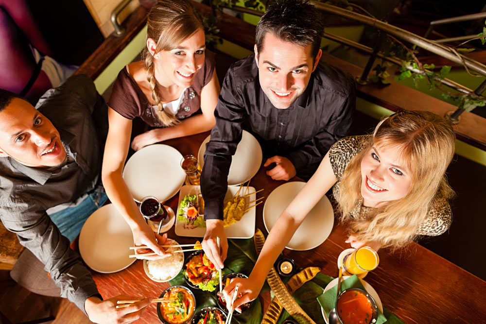 Young People Eating in a Thai Restaurant