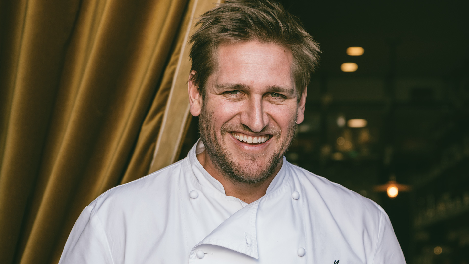 Chef Curtis Stone smiling