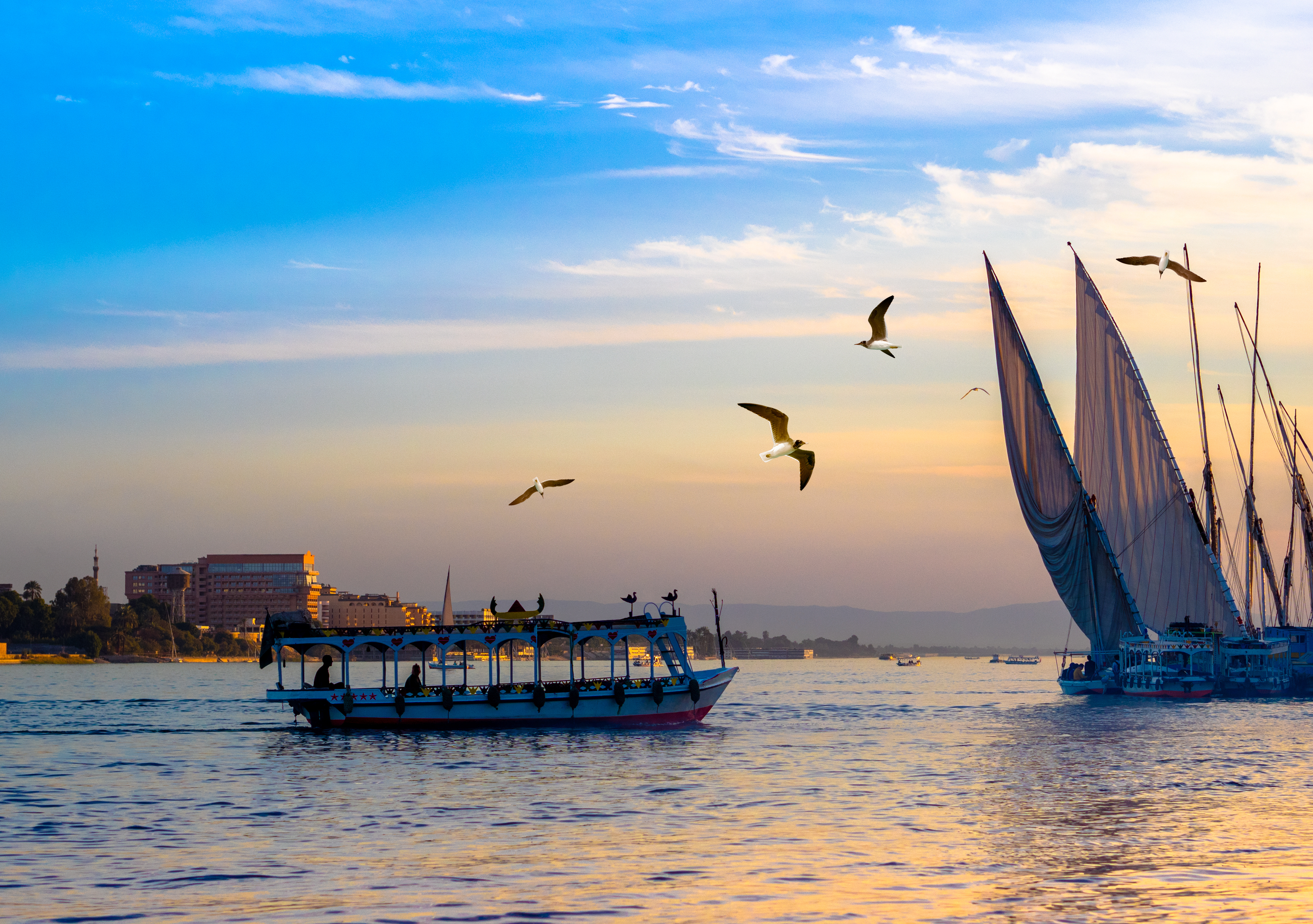 nile river cruise vessel at sunset
