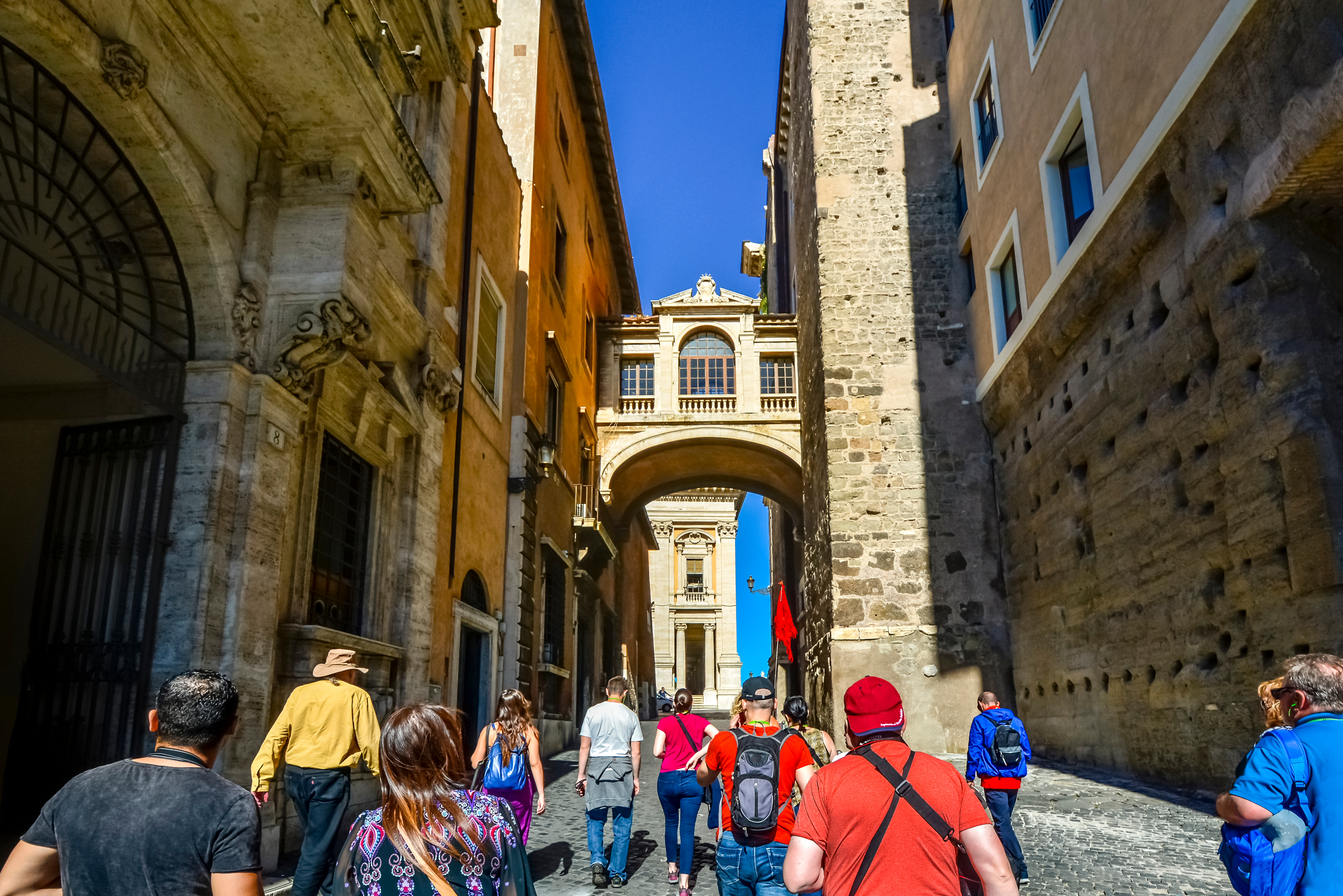 a group of travellers on a european city street