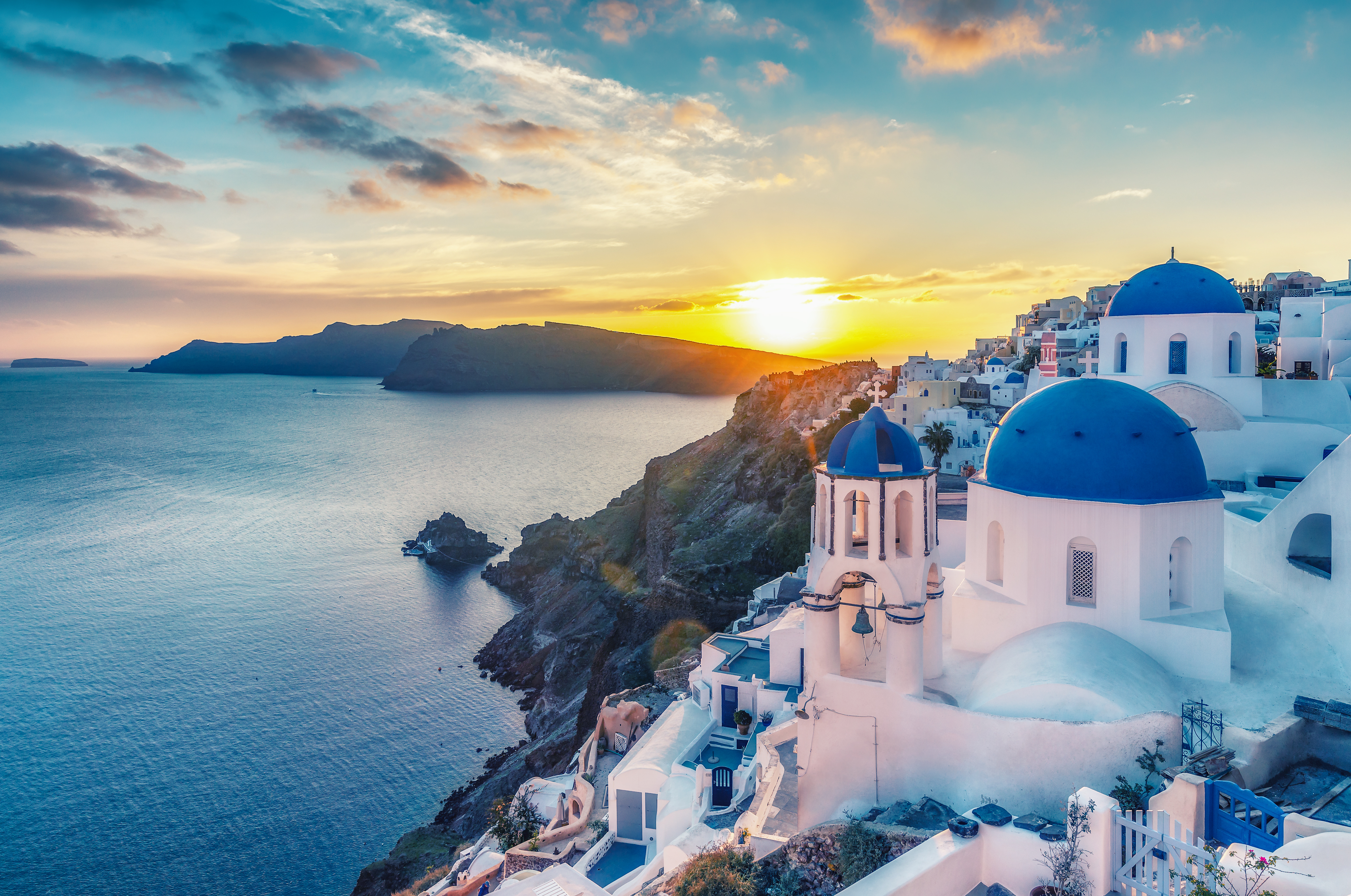 Sunset views of the sea from Oia on the Greek Island of Santorini.