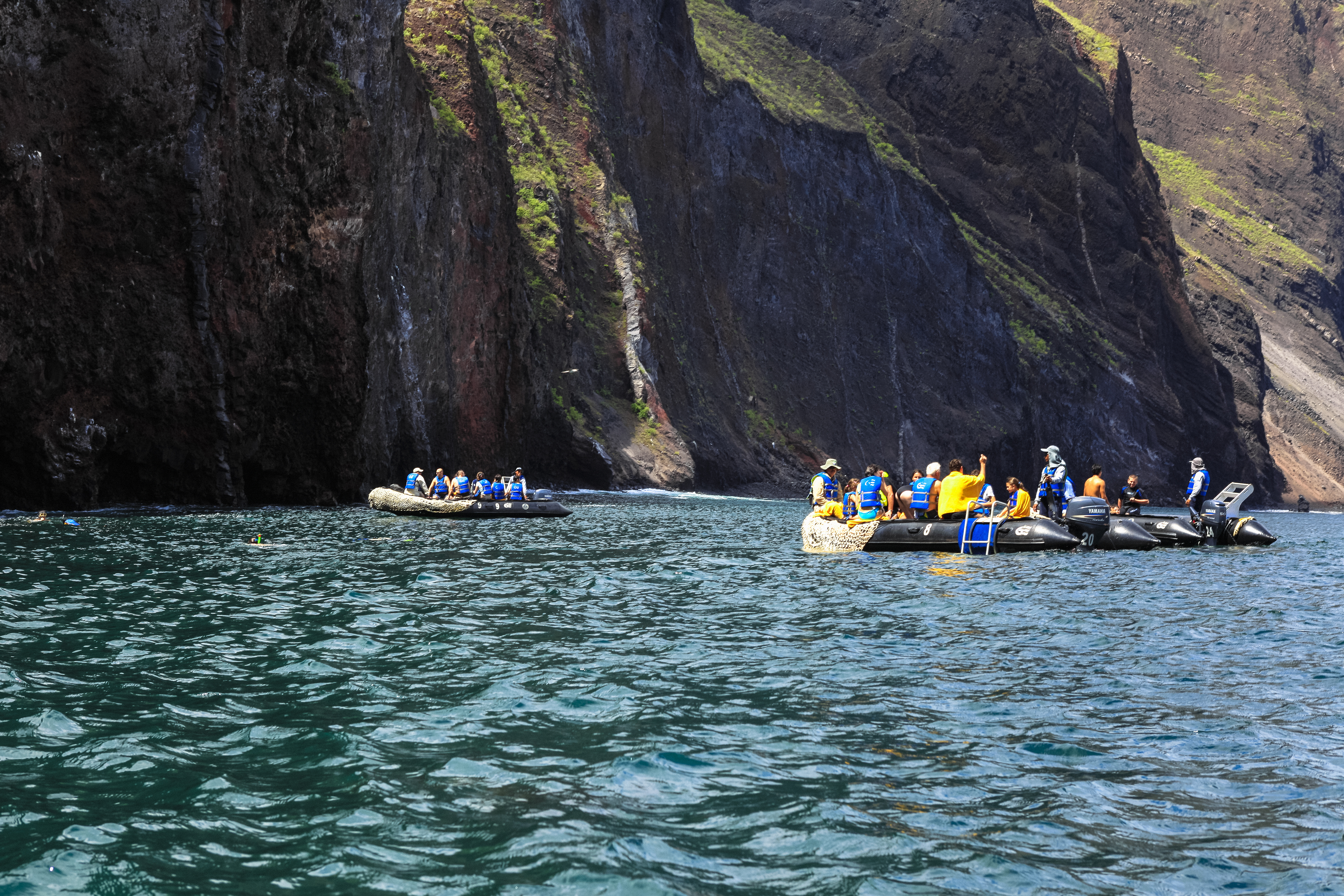  Tourists aboard inflatable boats in the Galápagos Islands, Ecuador.
