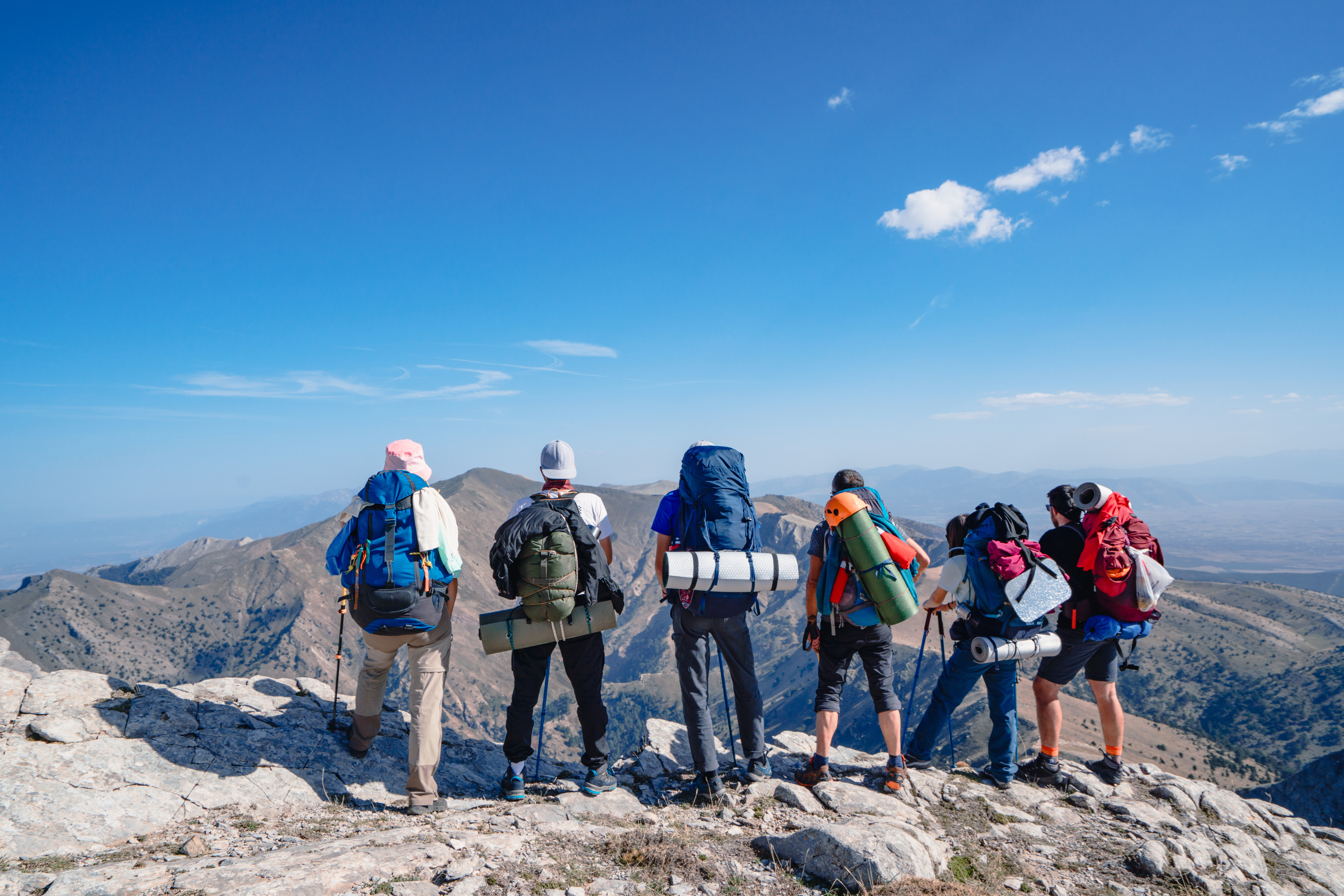 People Watching the beautiful scenery of mountain peaks.
