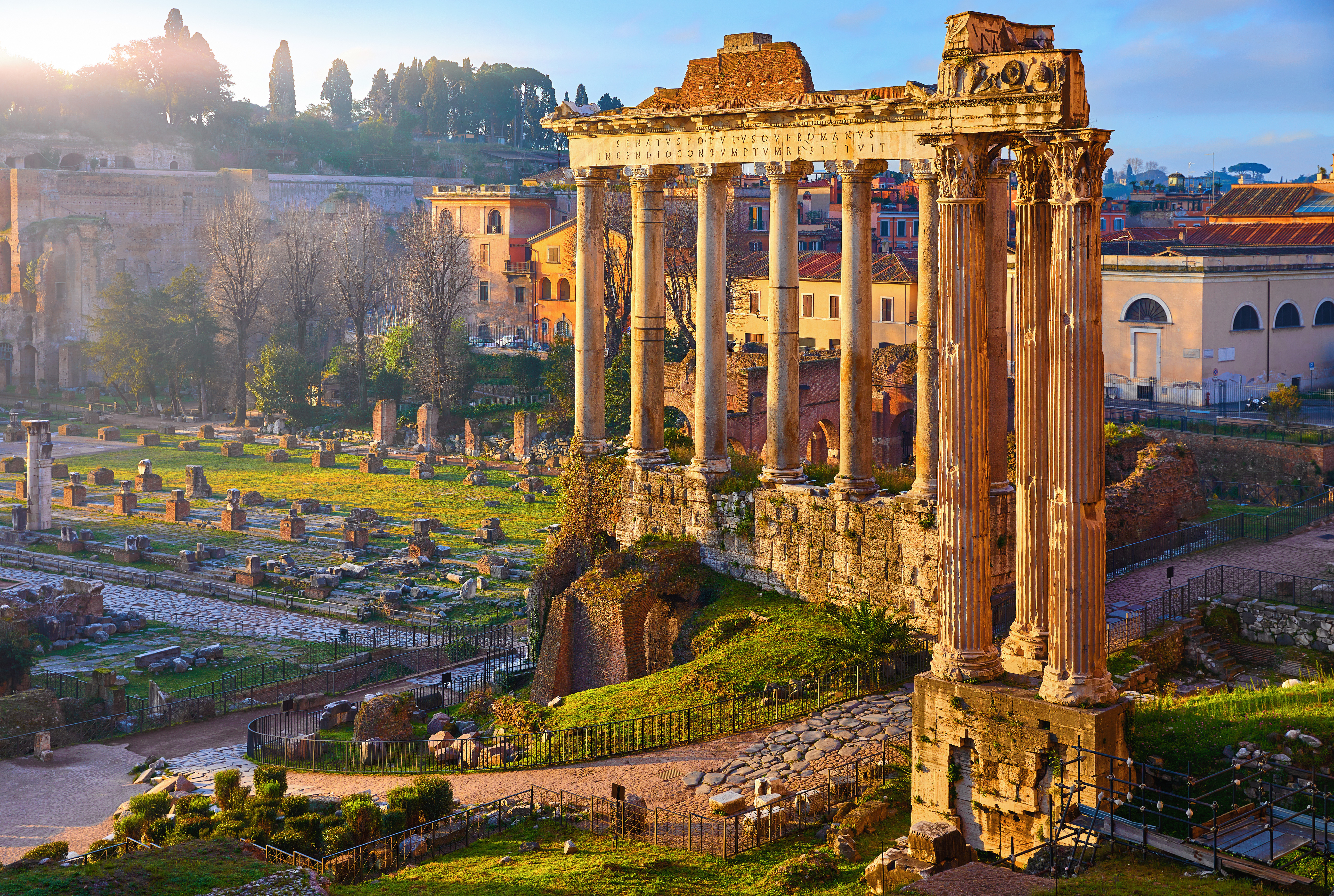 ancient columns in ruins within modern city centre