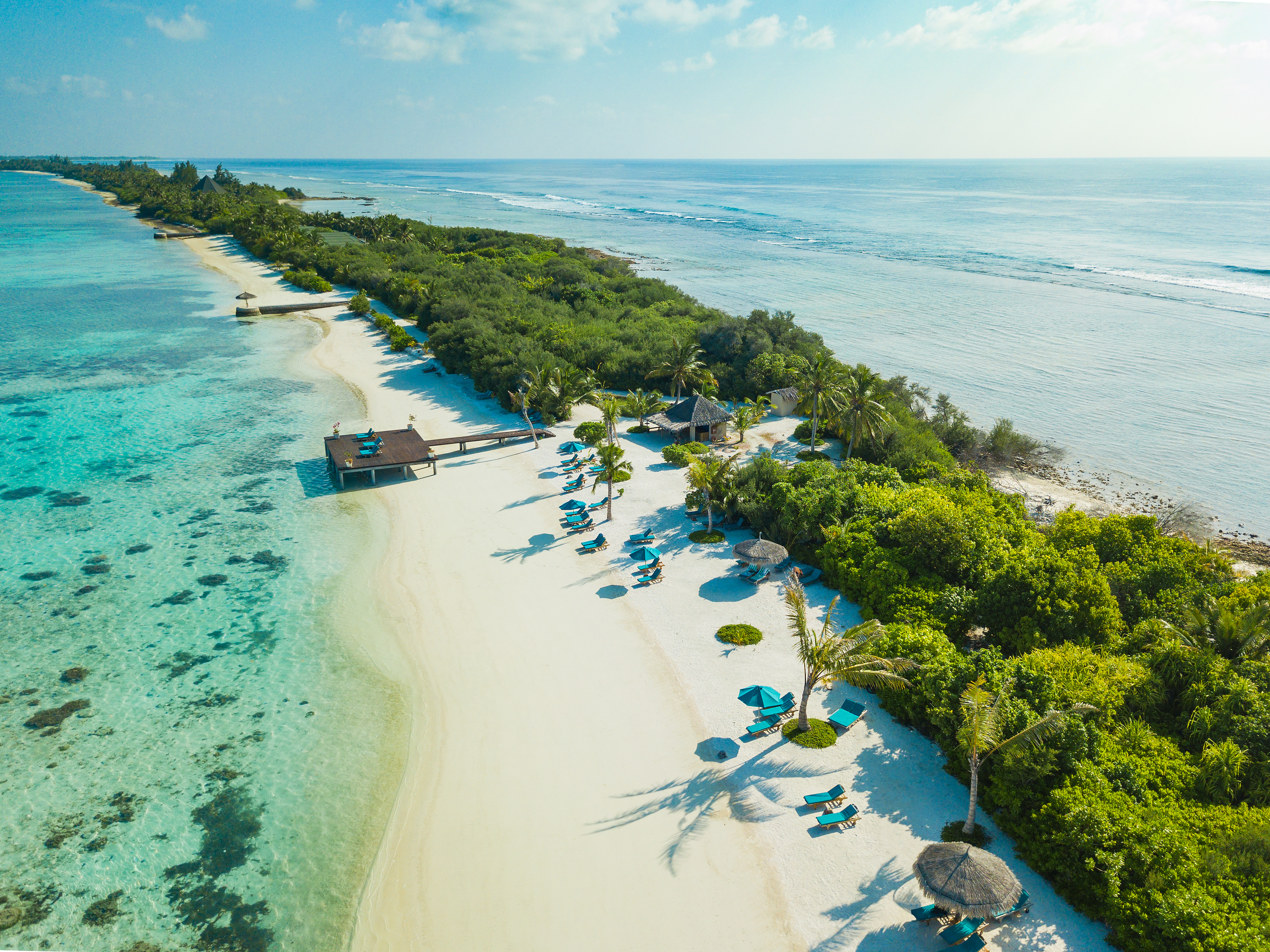 aerial view of pristine white-sand beach in the Maldives