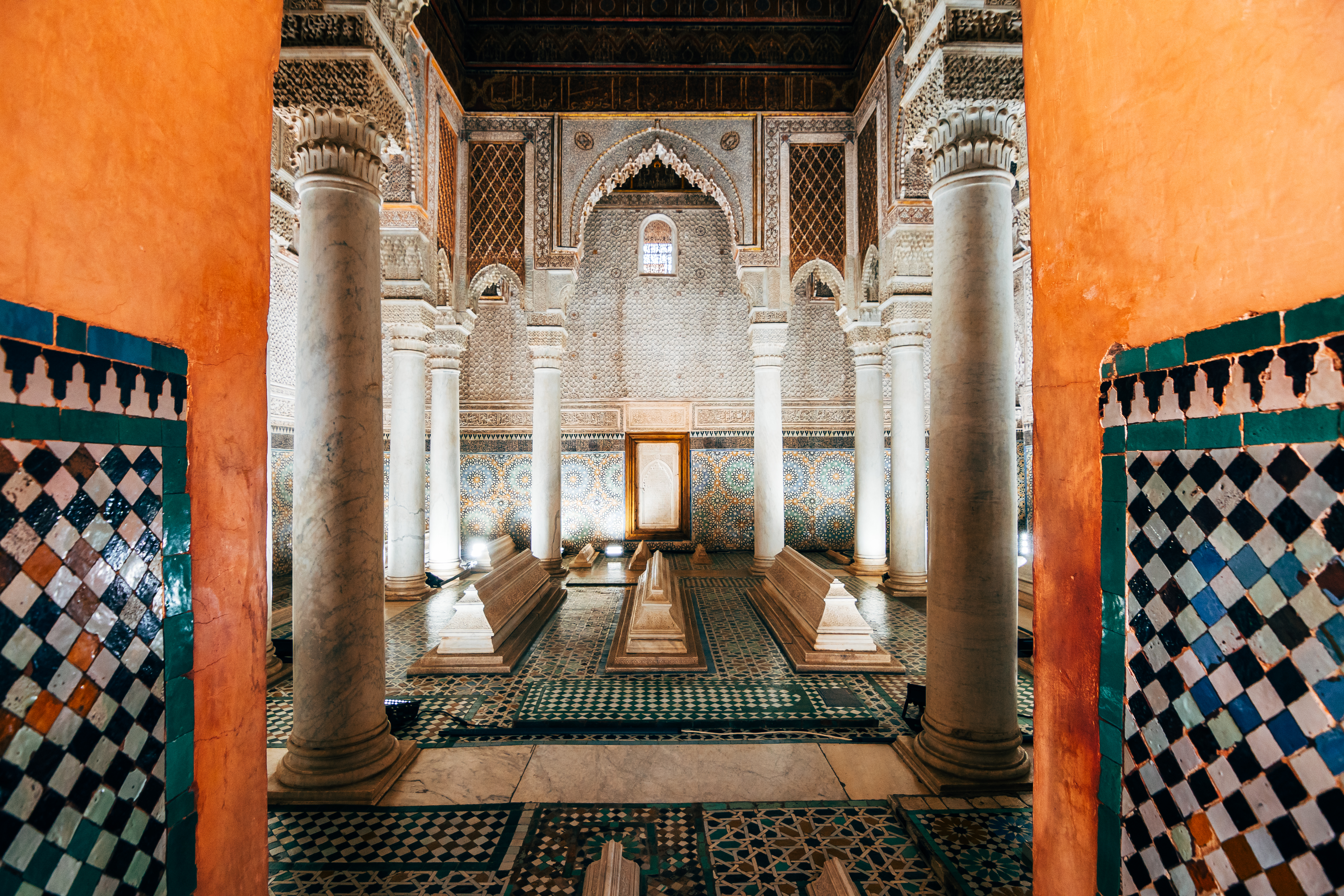 The ornate pillars and tile work of the Saadian Tombs in Marrakech, Morocco.