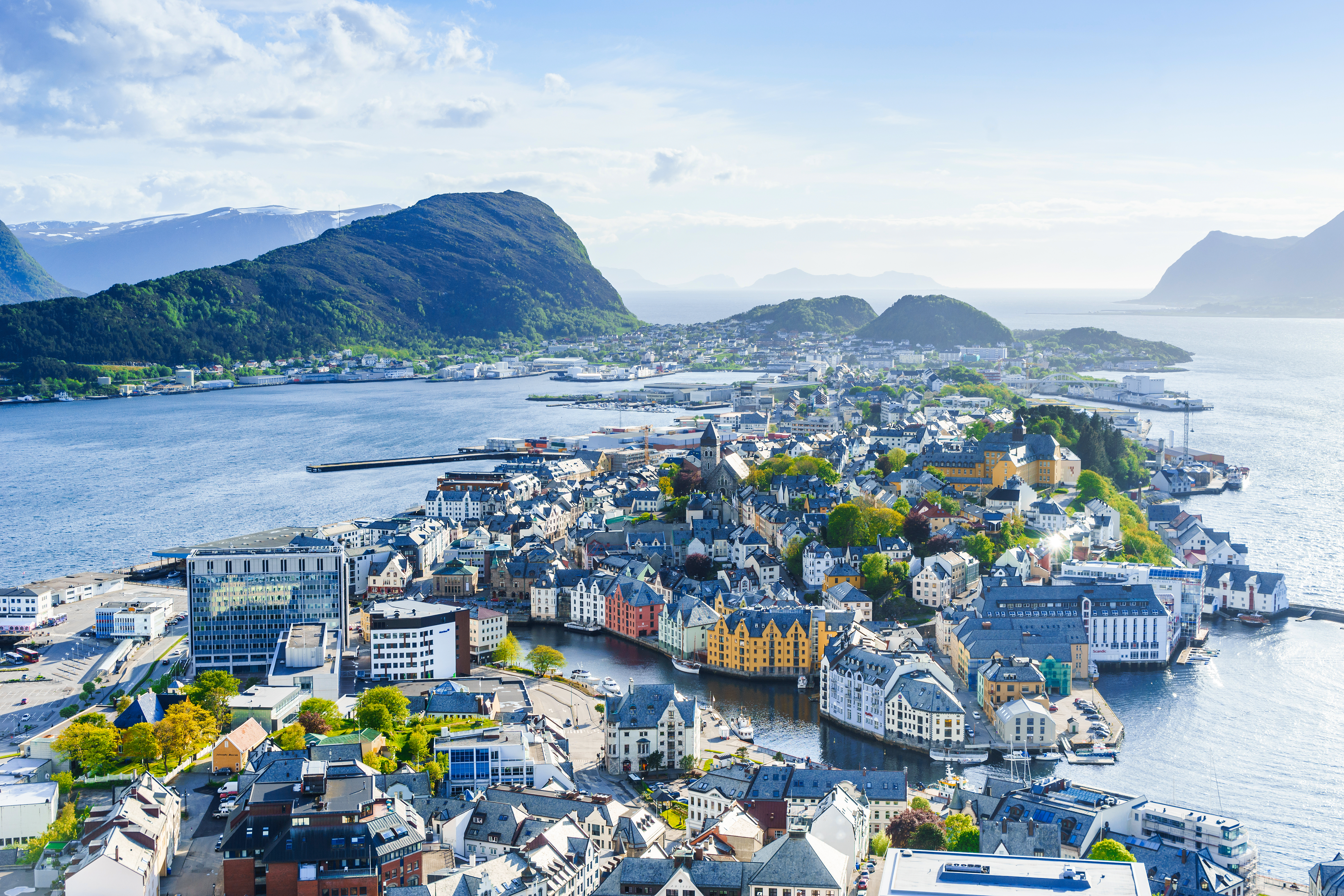 aerial view of Alesund in Norway, where the famous fjord of Geirangerfjord begins its journey into the mainland.