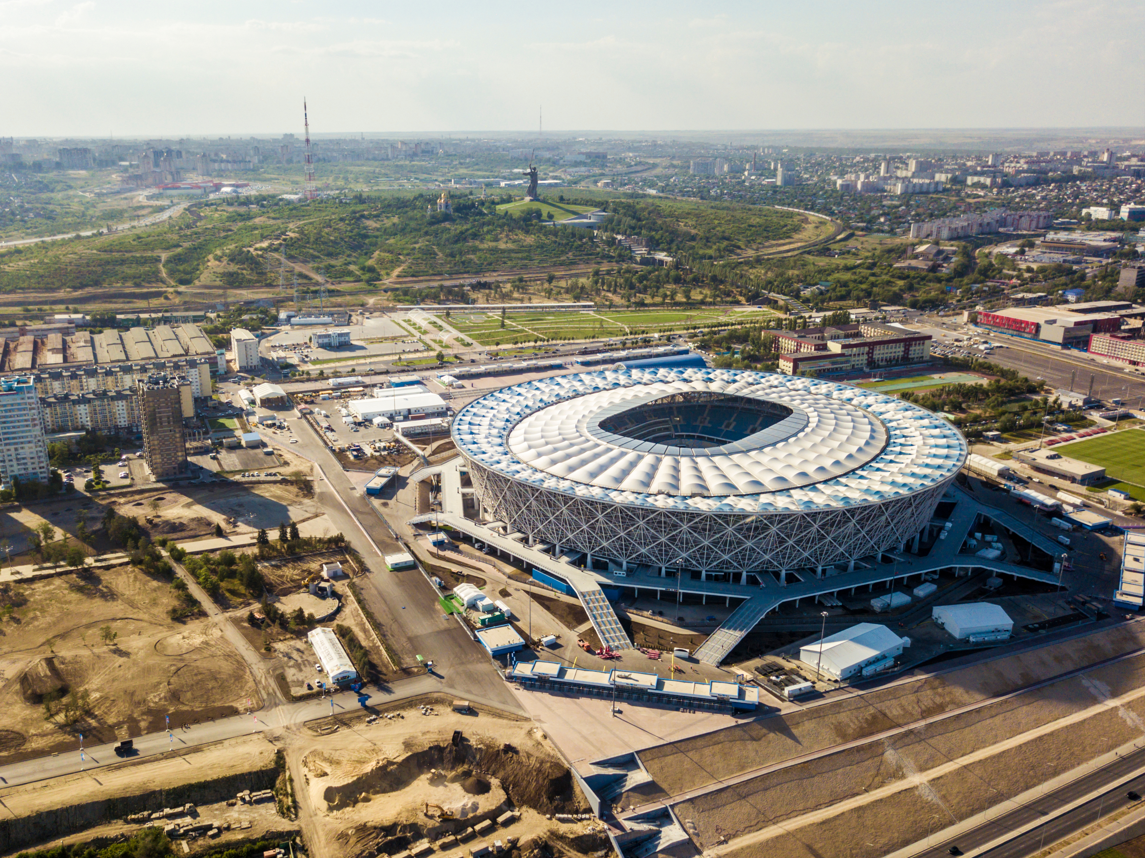 aerial view of football stadium on edge of city