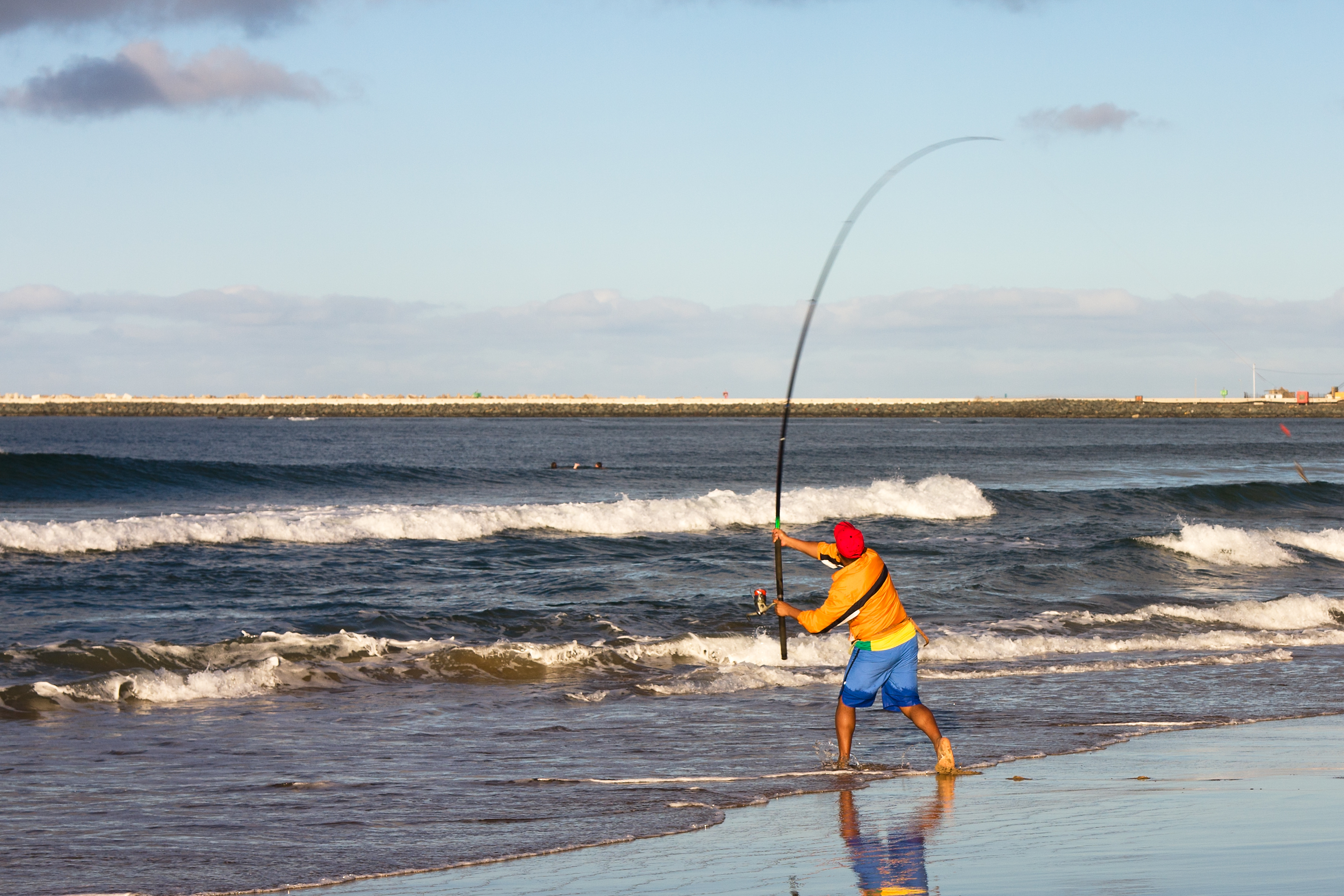 Fishing on the beach in Durban, South Africa.