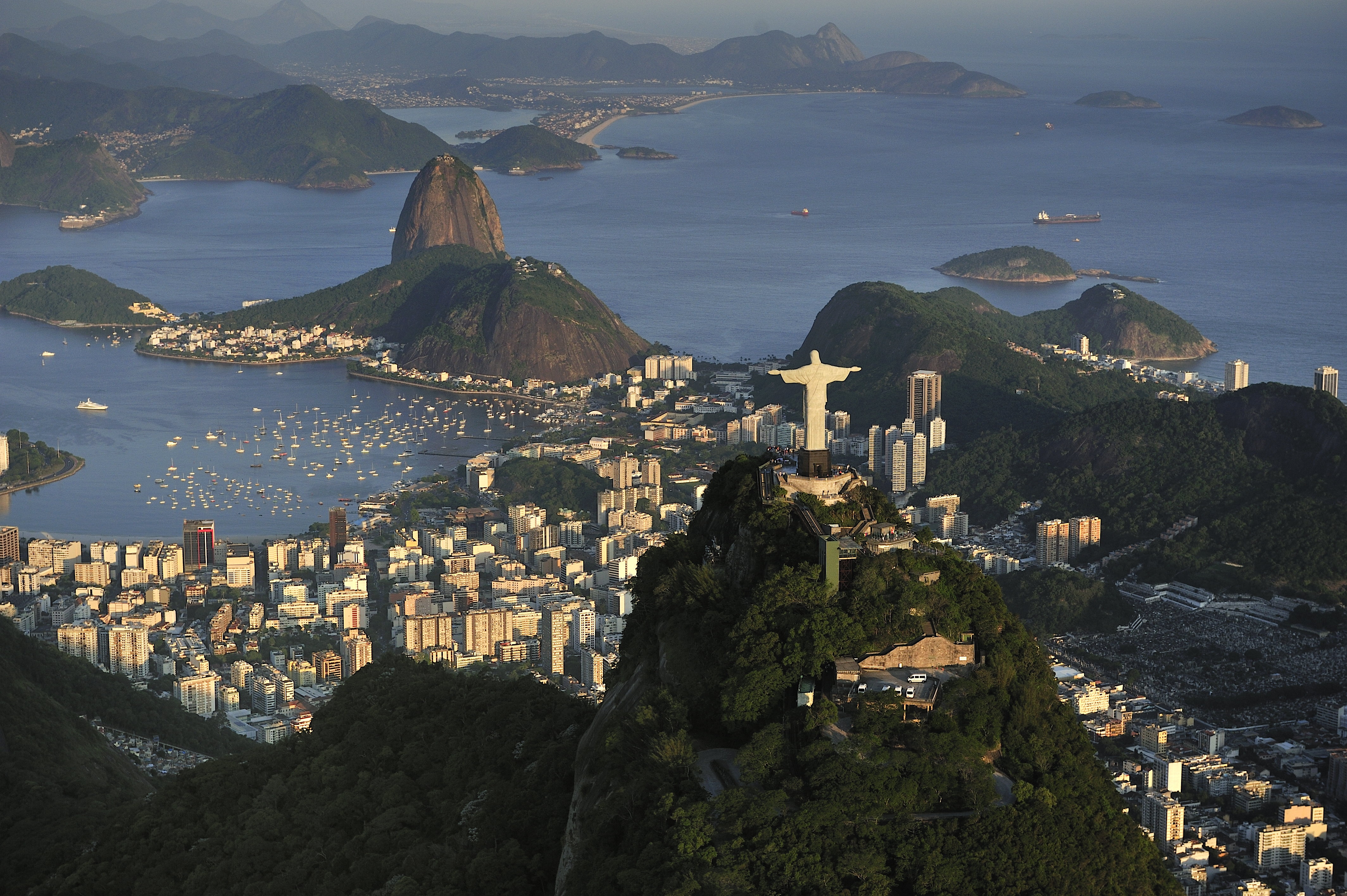 Christ the Redeemer statue on top of Corcovado Hill, overlooking Guanabara Bay and Sugarloaf, Rio de Janeiro, Brazil