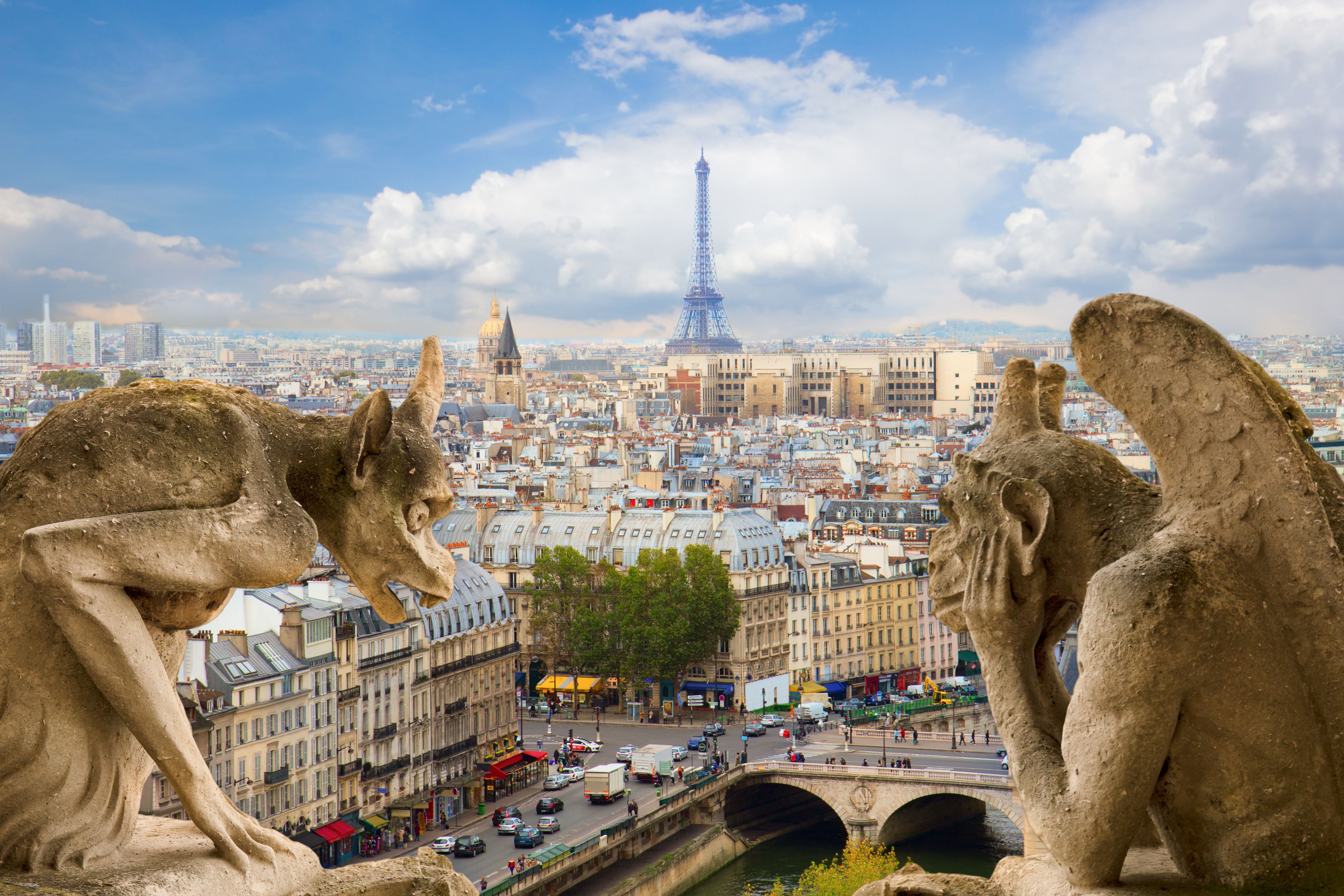 Gargoyle on Notre Dame Cathedral and city of Paris France
