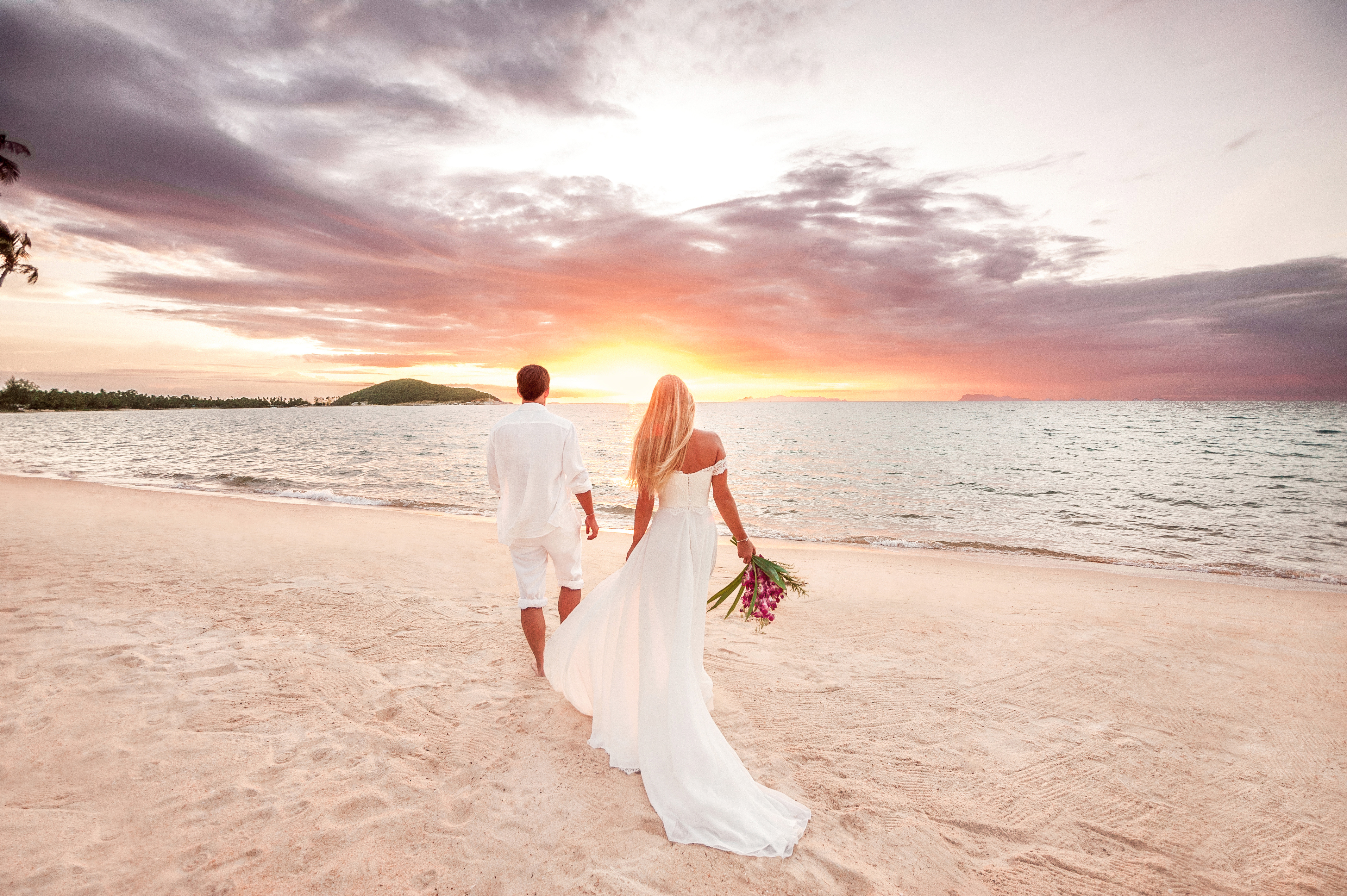 Newly married young couple by the sea, Thailand
