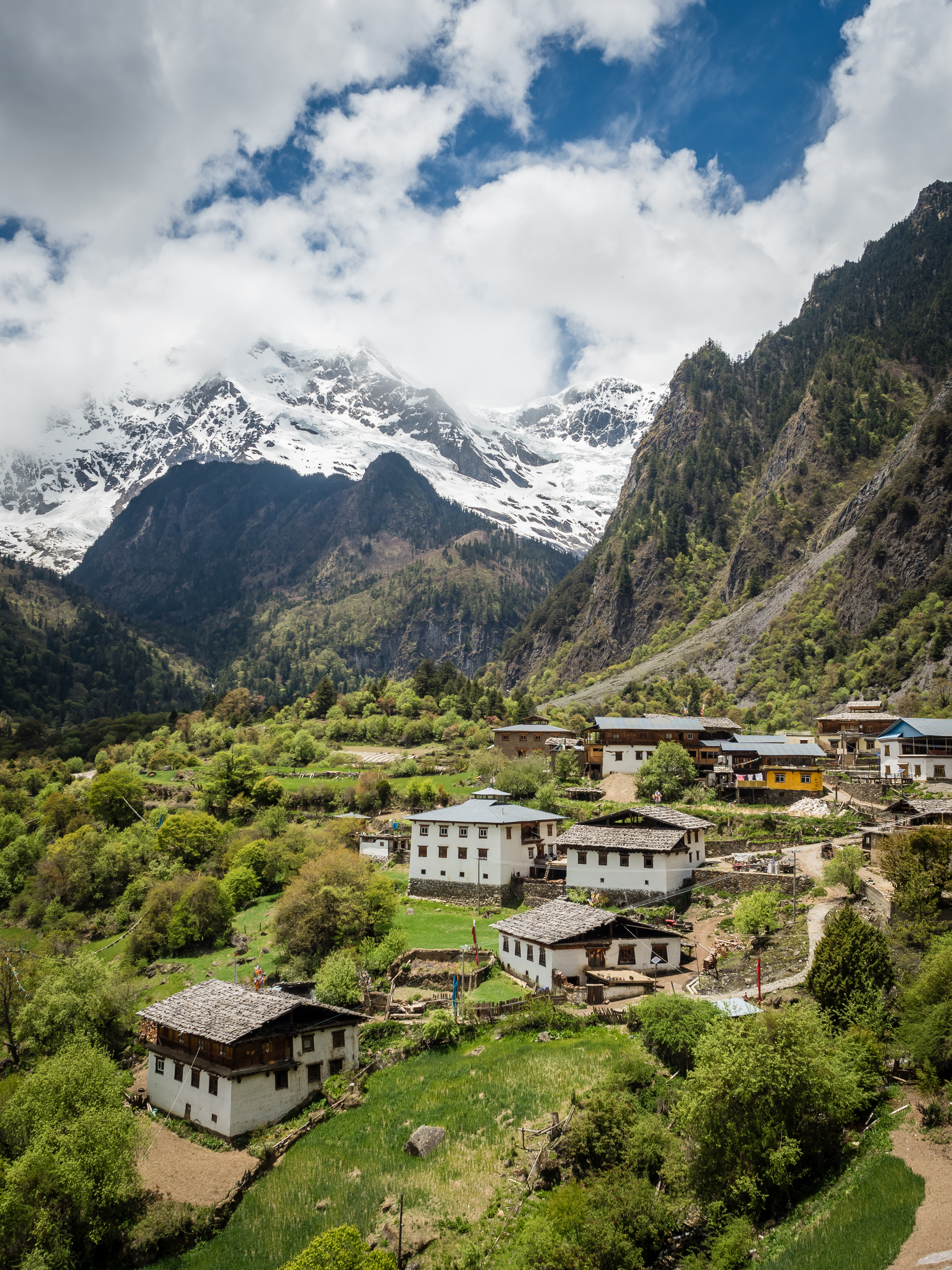 aerial view of mountain village with traditional homes