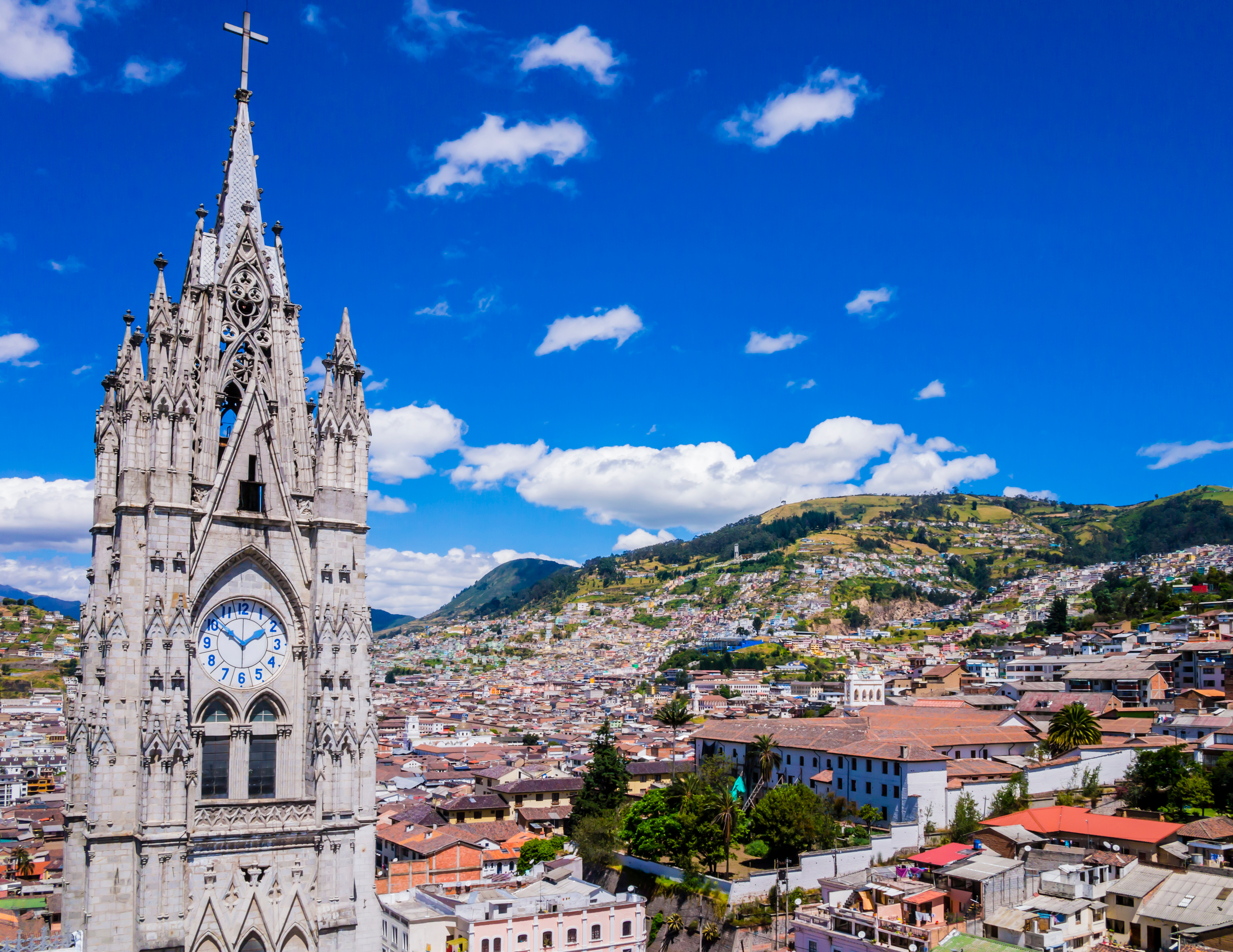 basilica in the old town of Quito against the backdrop of the hillside
