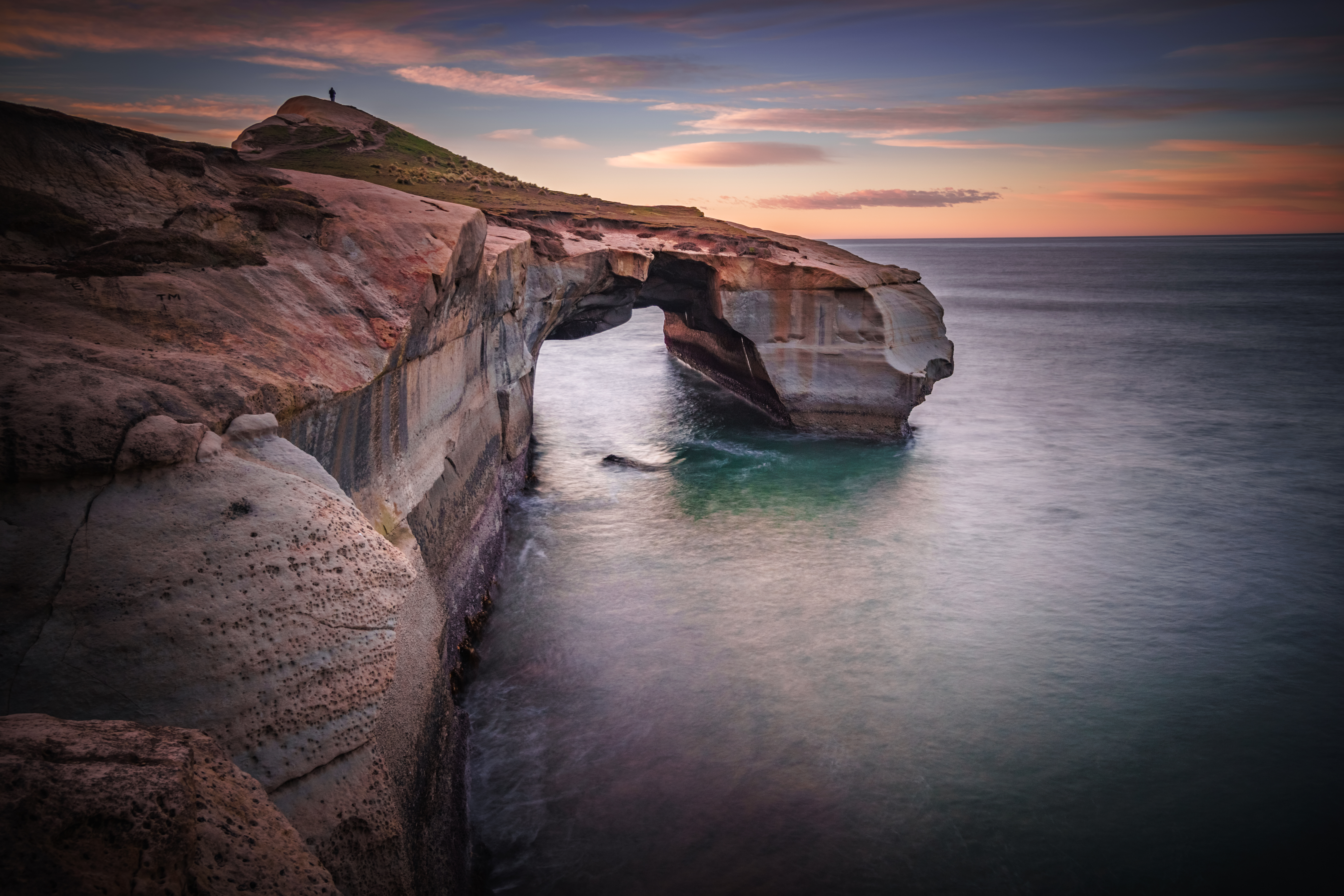 A sunrise long exposure at Tunnel Beach, Dunedin - New Zealand