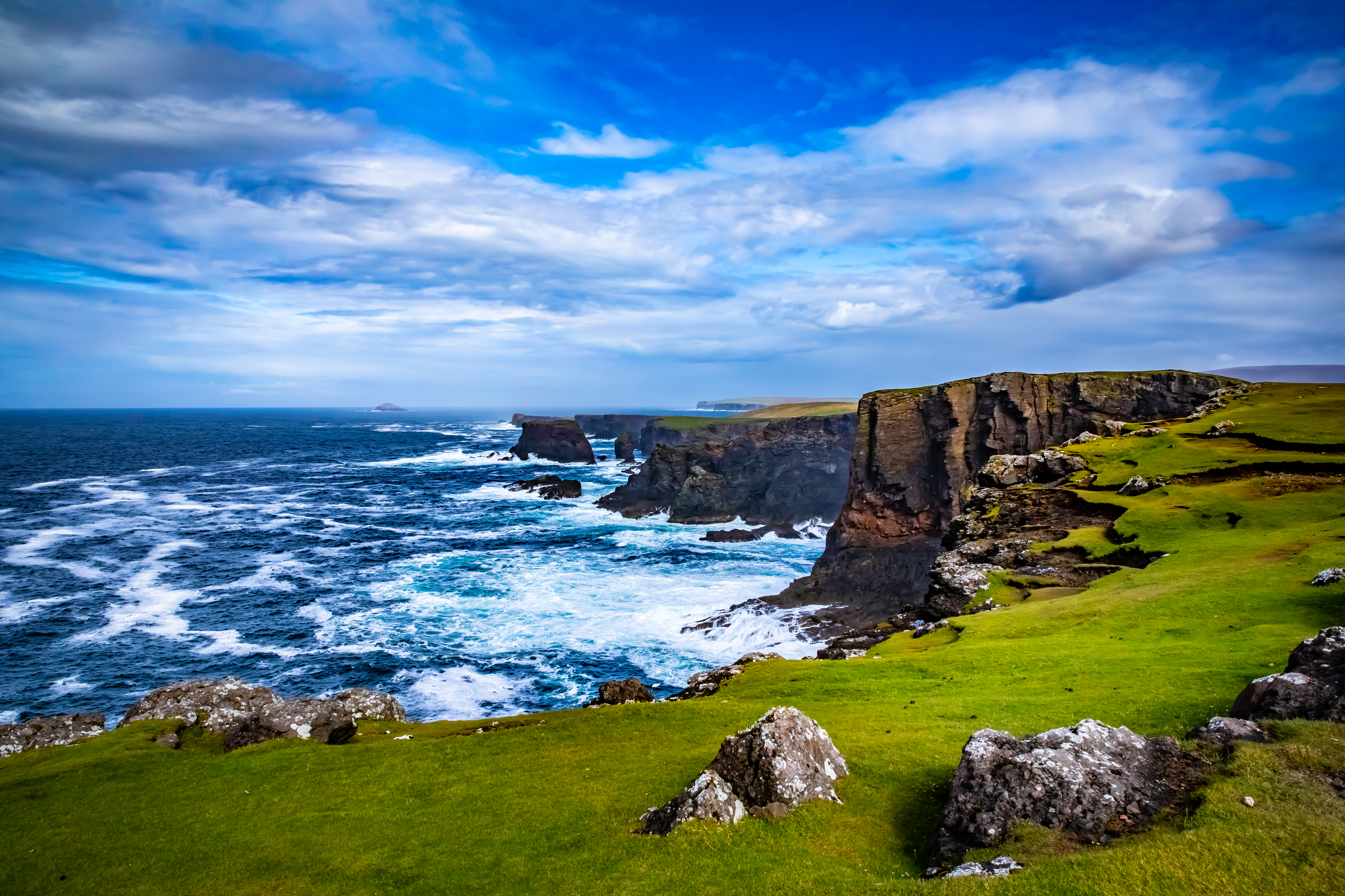 Views of archipelago cliffs and waves crashing