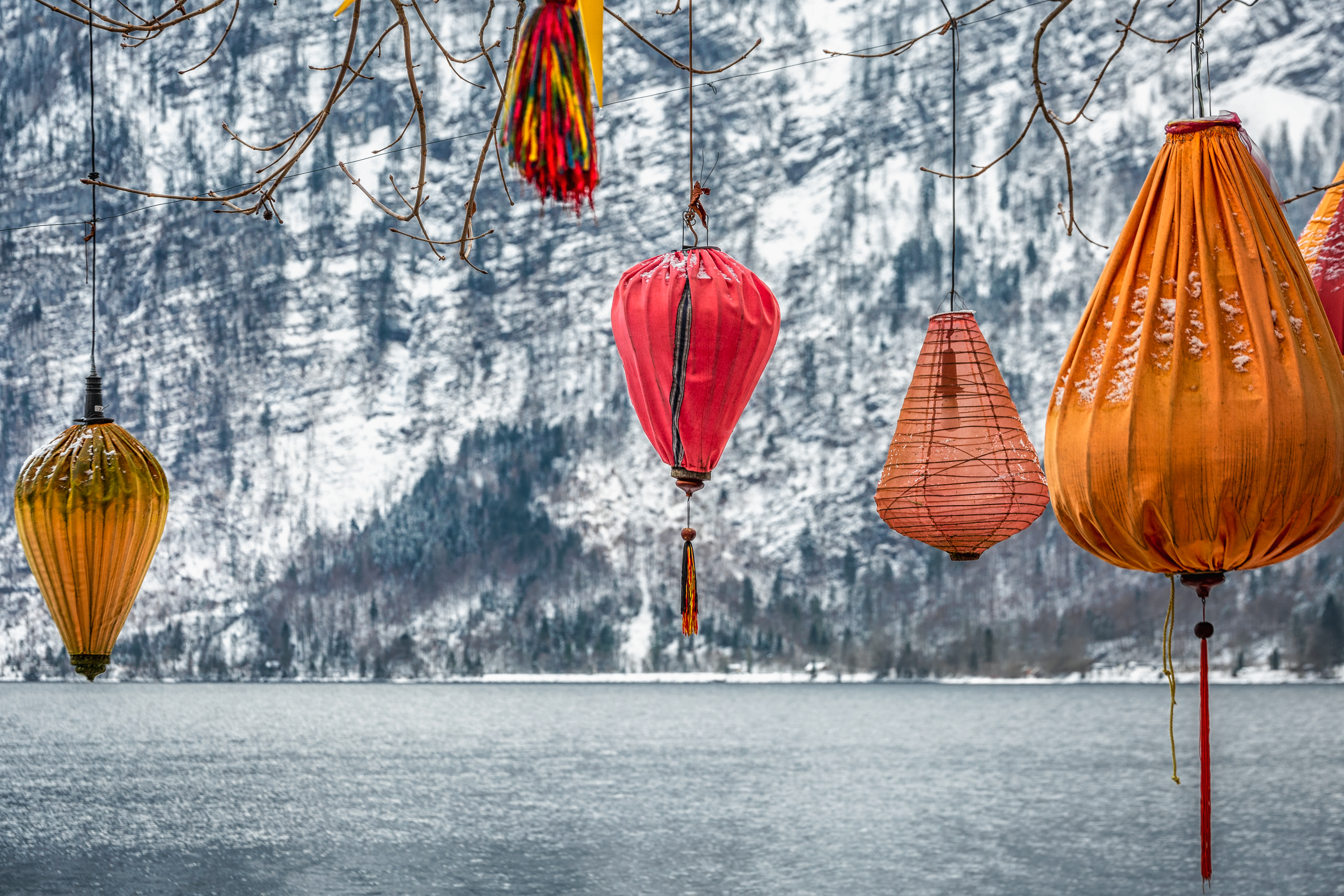 Scenic picture-postcard view of famous Hallstatt mountain village in the Austrian Alps at beautiful light in winter, Salzkammergut region