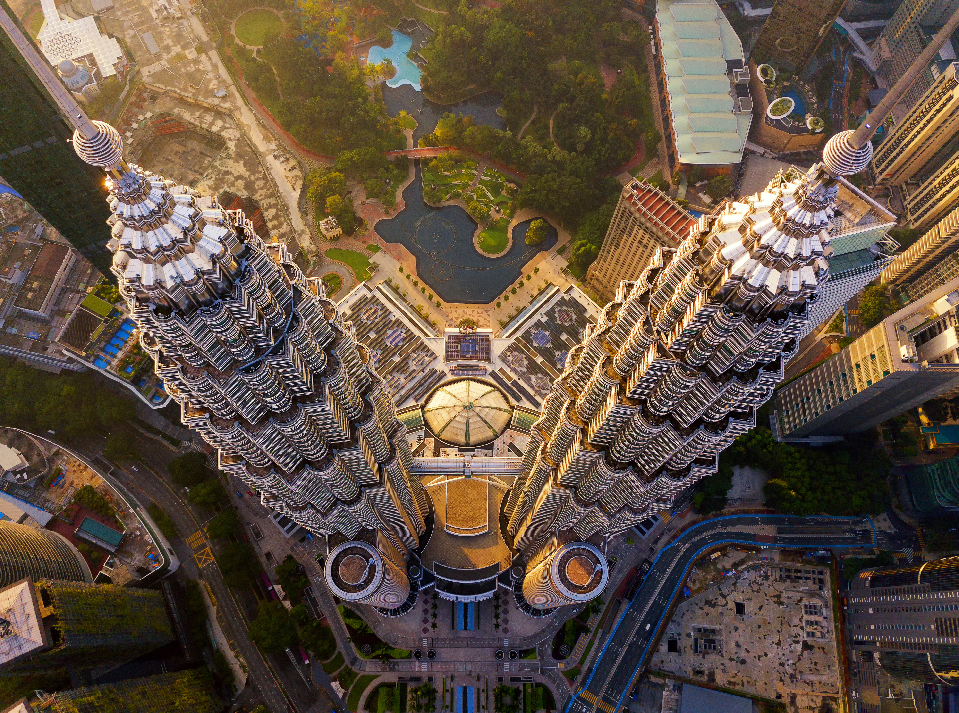 Aerial view looking down at the top of Petronas Twin Towers in Kuala Lumpur, Malaysia