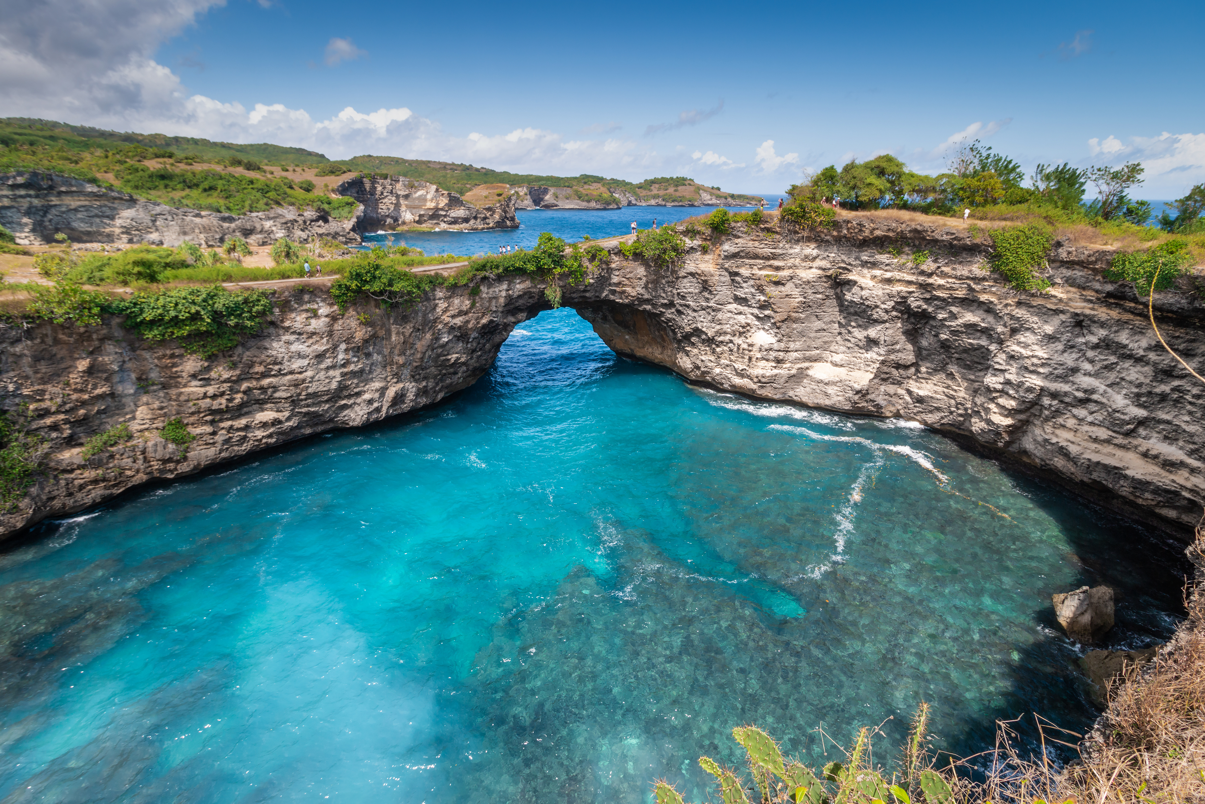 Stone arch over the sea called Broken beach on Nusa Penida ,Indonesia