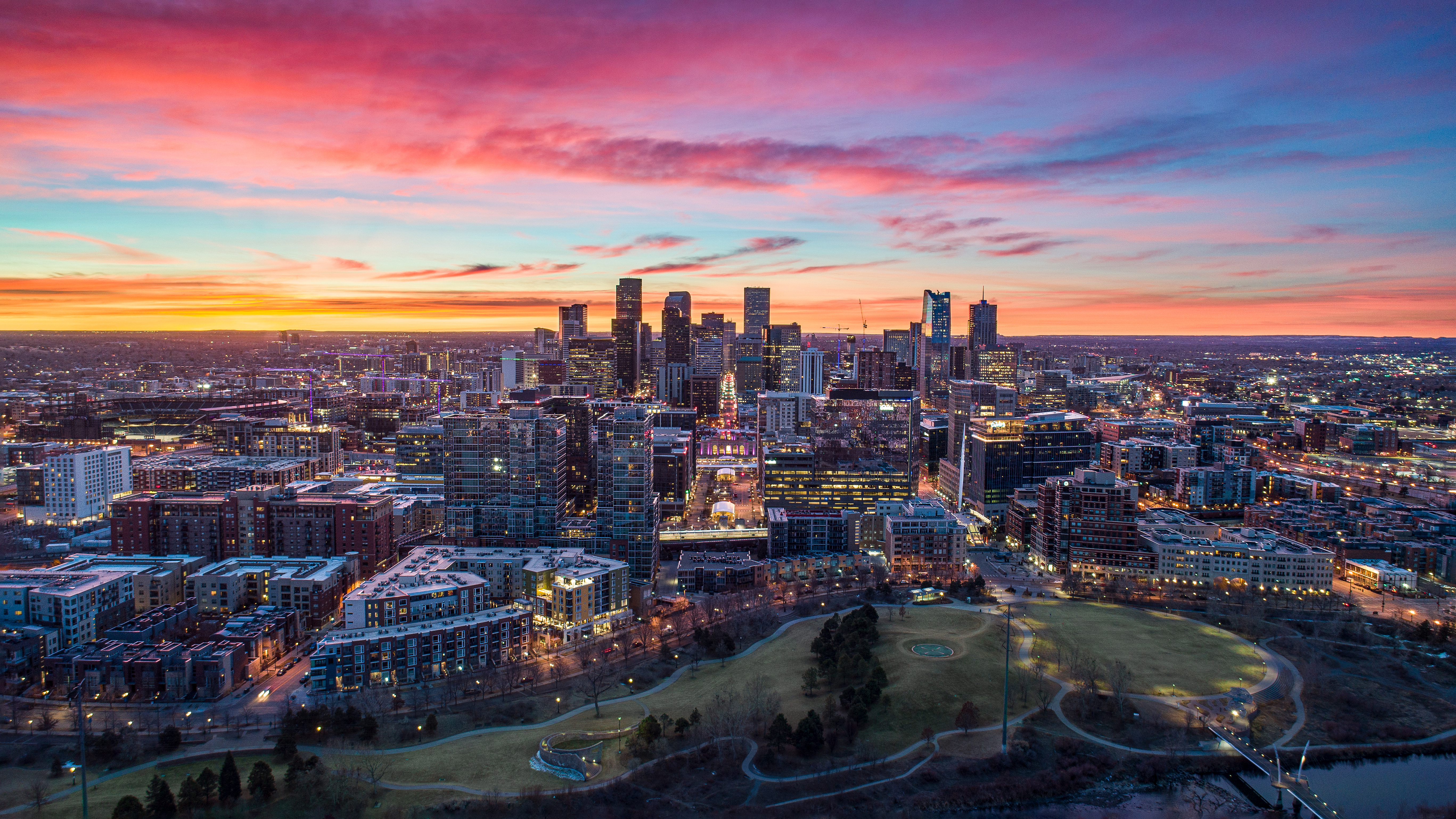 Skyline Aerial Panorama taken by drone during vibrant sunset.