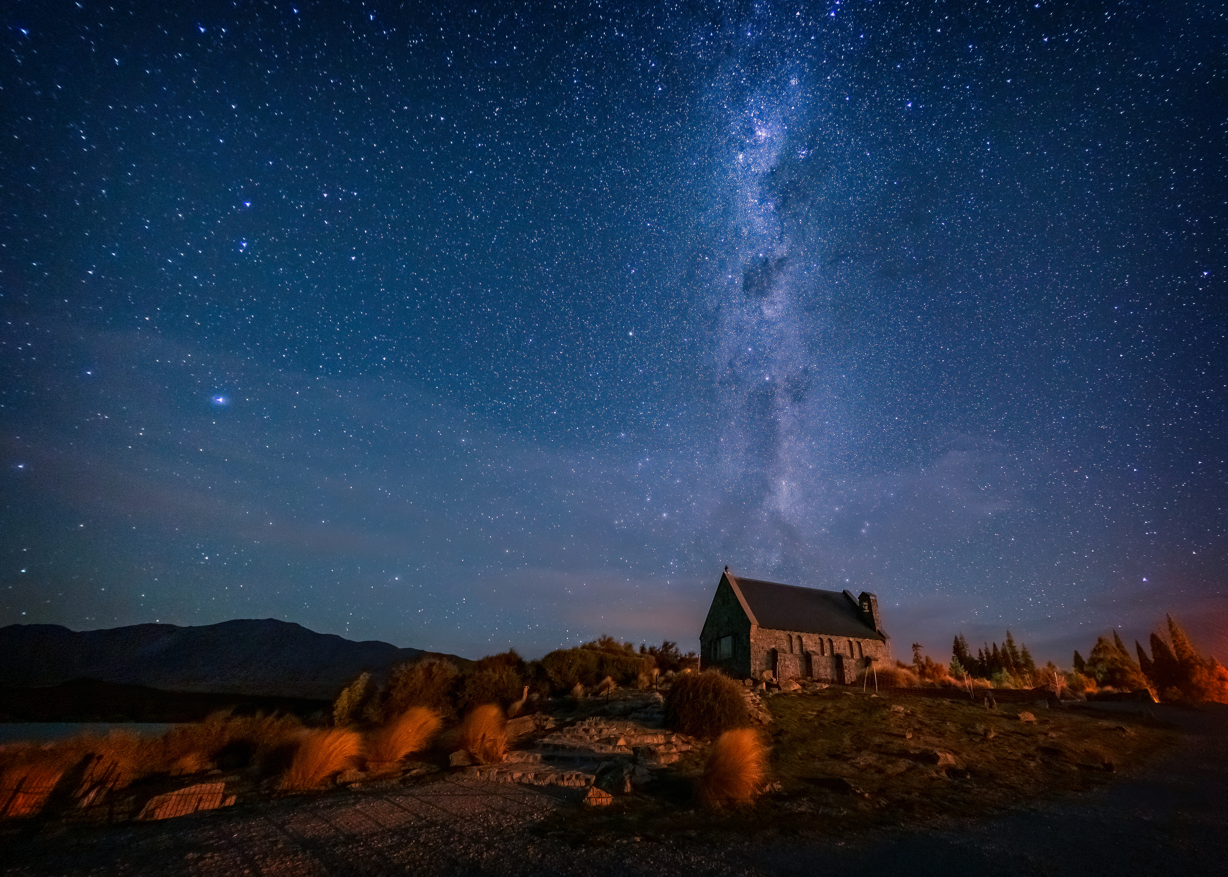 Astrophotography shot of the milky way over the Church of the Good Shepherd in Lake Tekapo at night