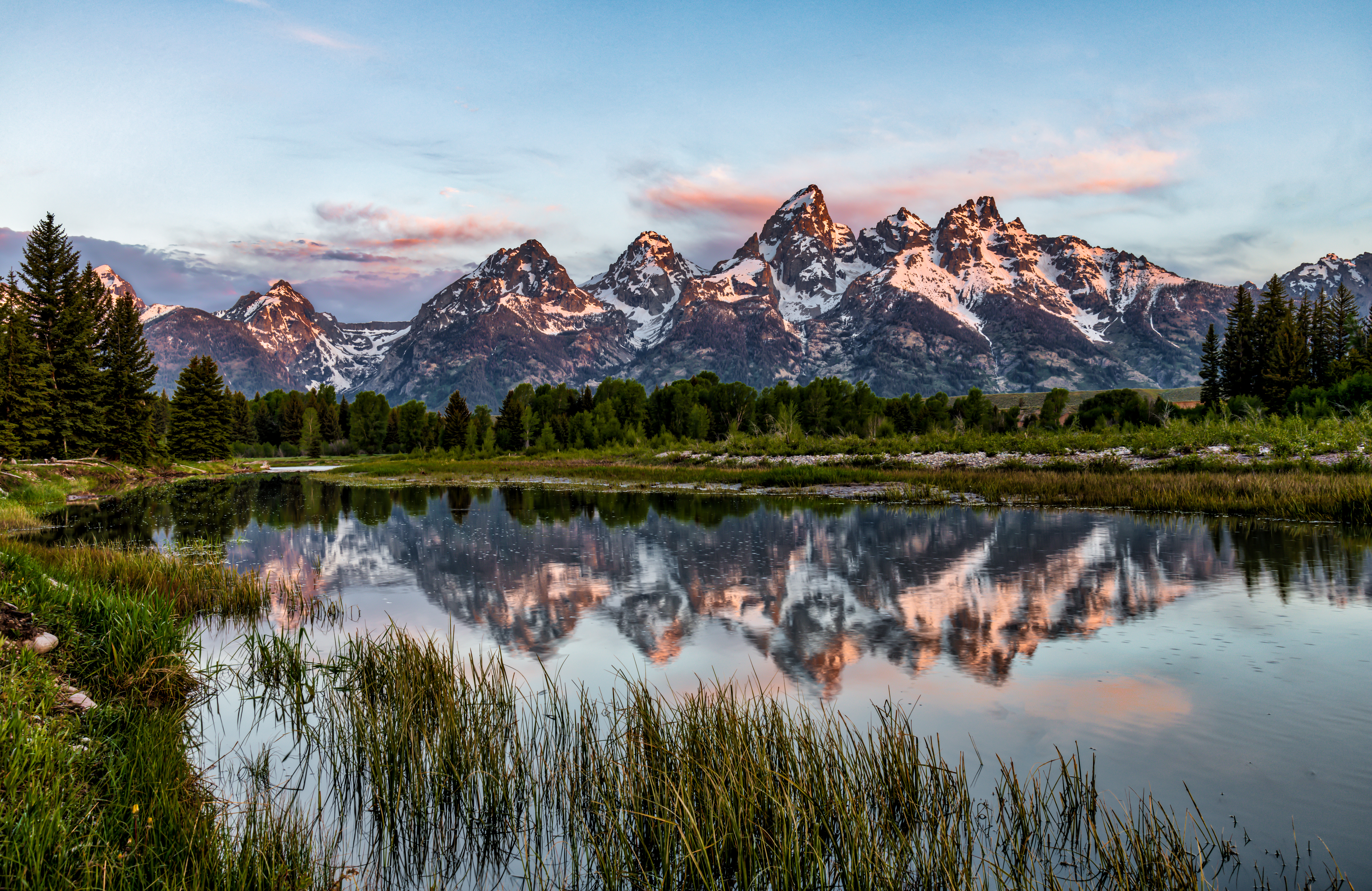 Reflections of Grand Teton Mountain reflecting in the water