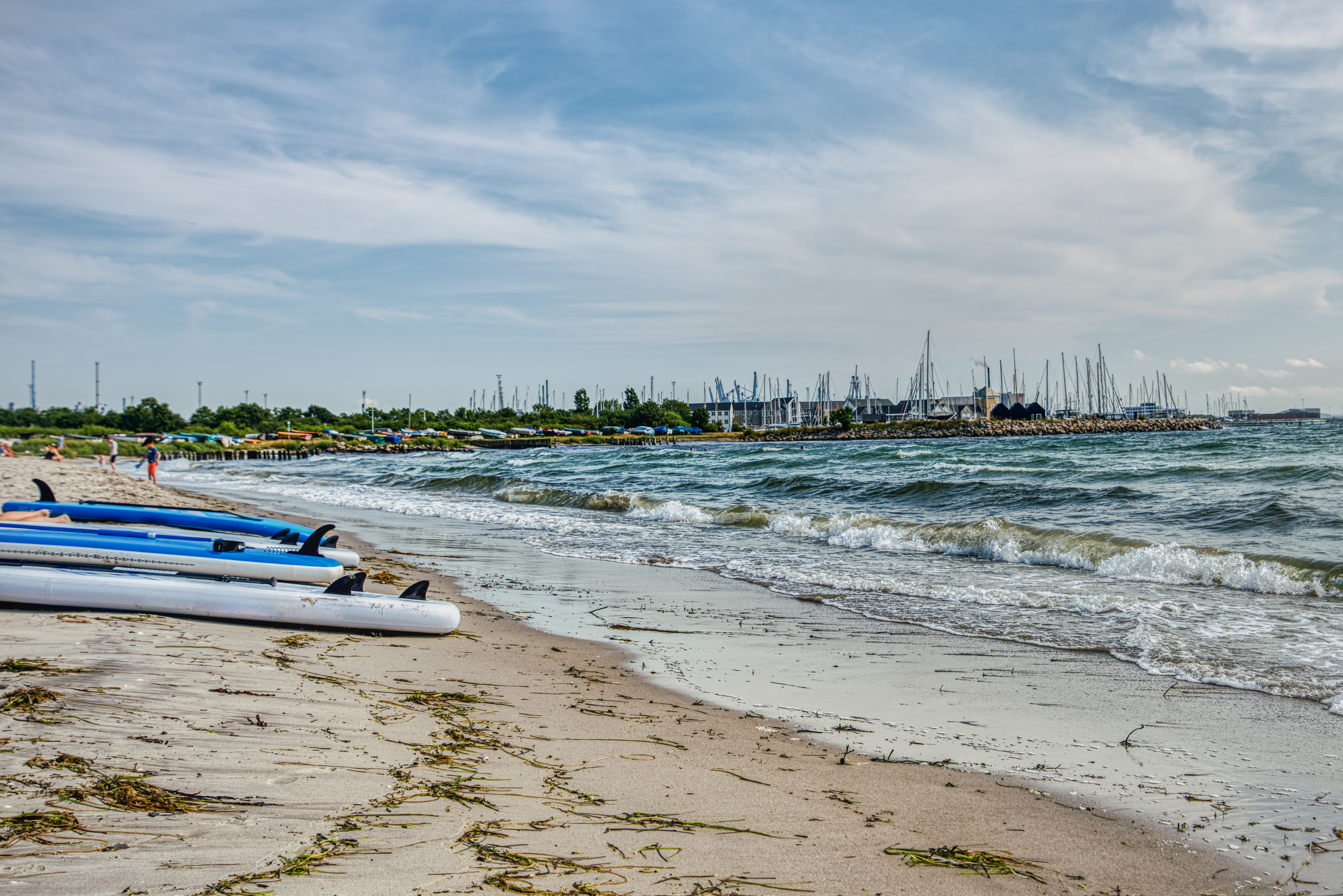 Surfboards on Marselisborg Strand convey sport, vacation and recreational concept
