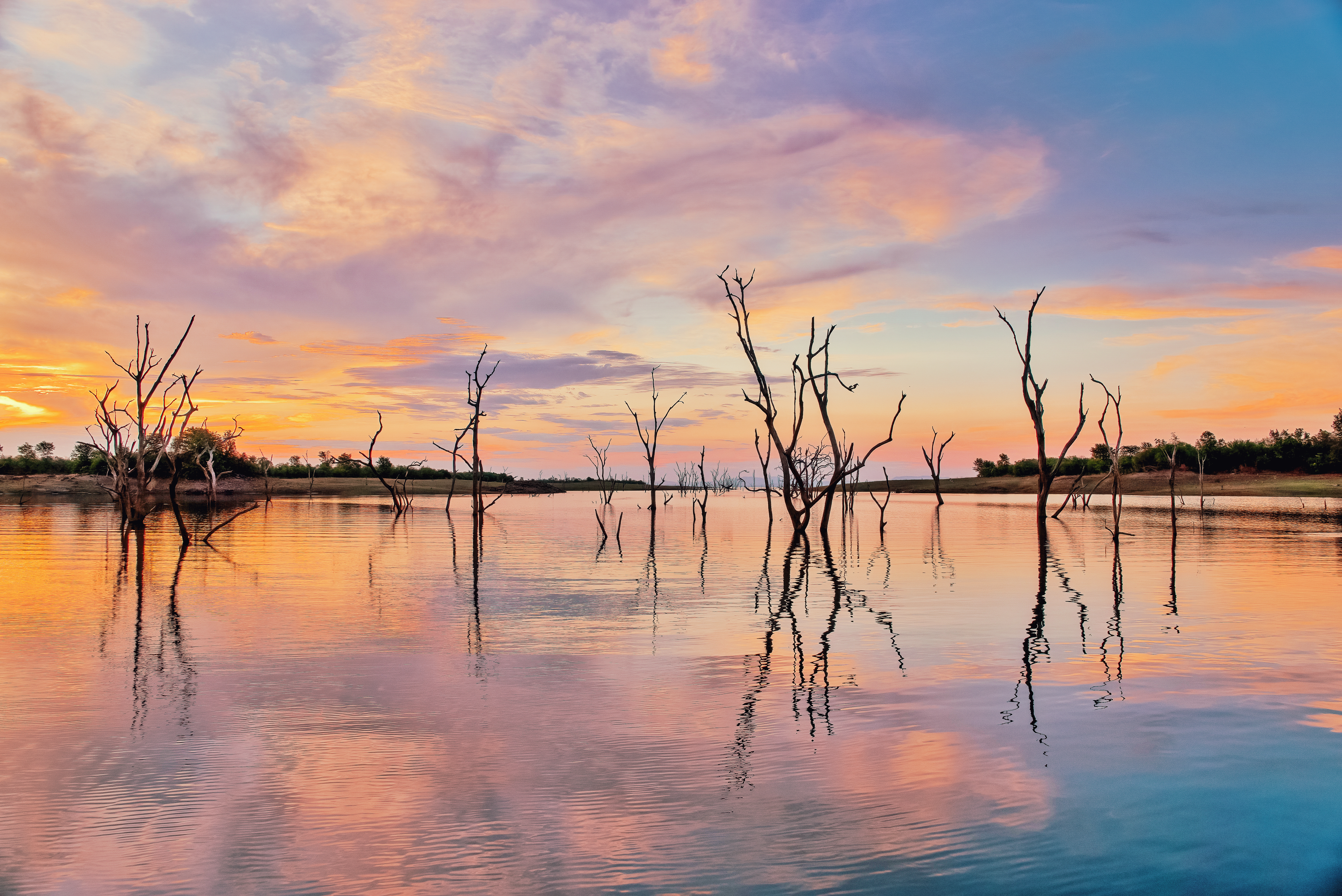 Lake Kariba is a man made lake, 226 km long and 40 km wide, located on the border between Zambia and Zimbabwe.