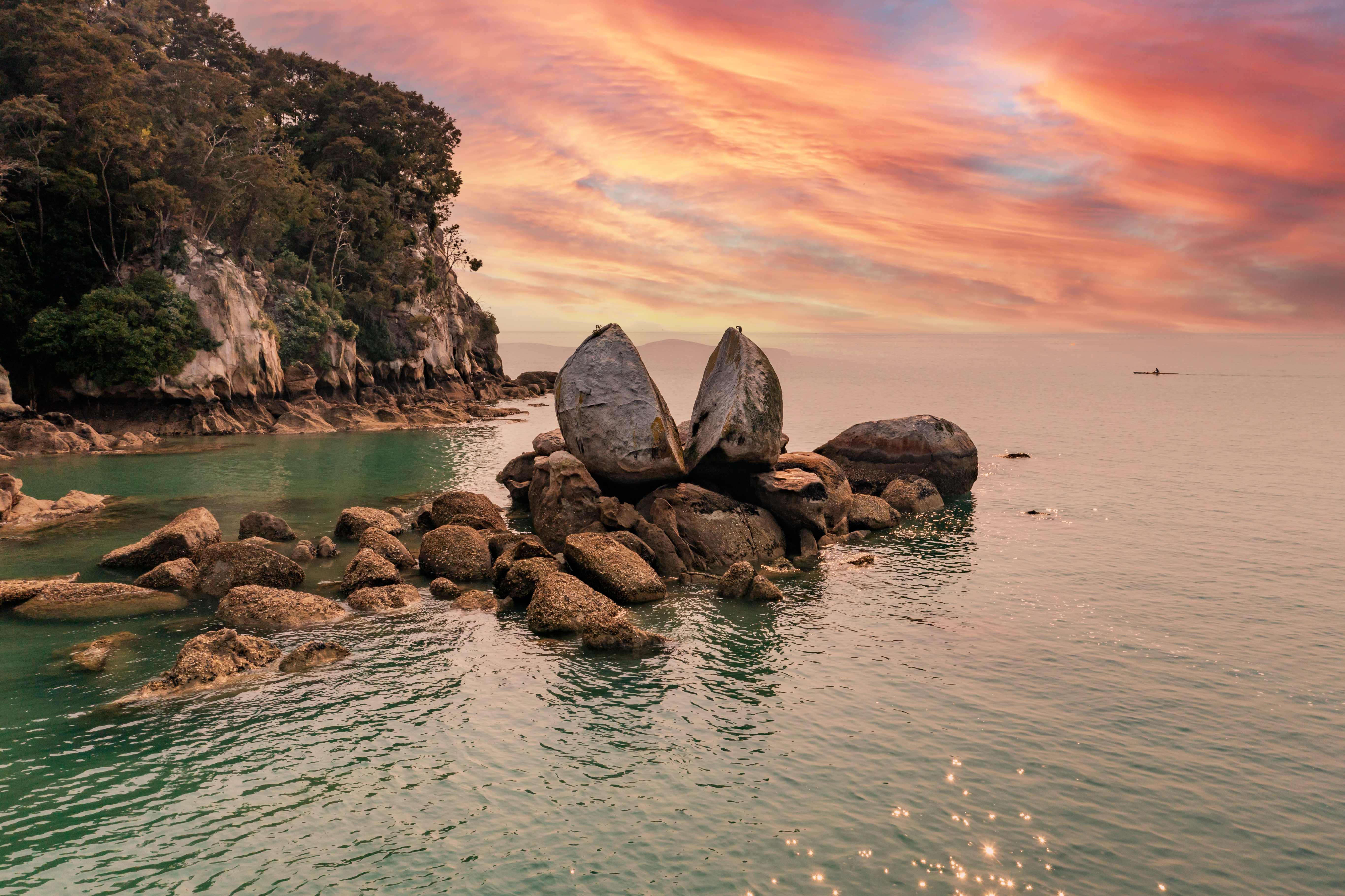Famous rock and tourist site in national park with sunset in the background