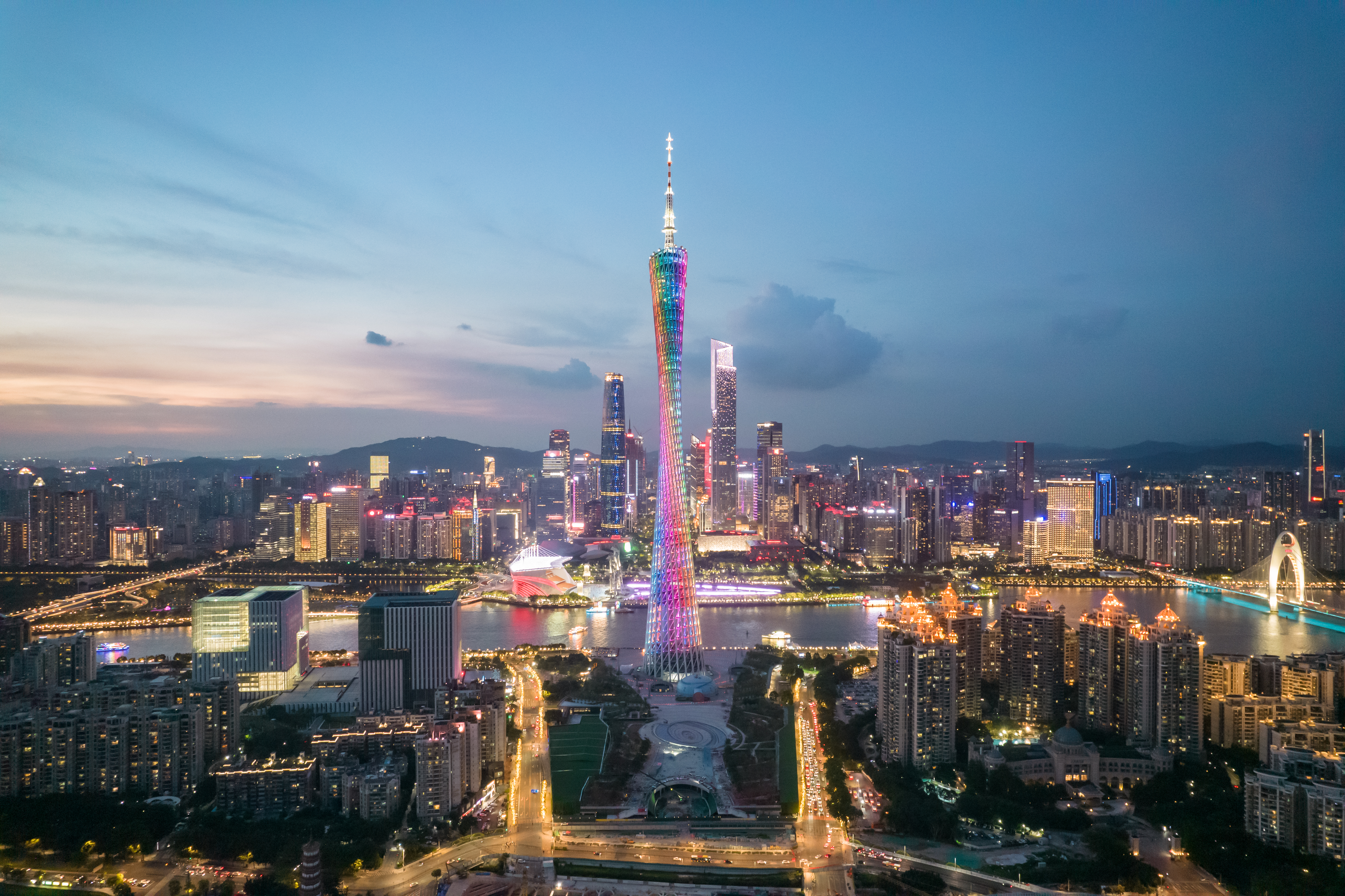 Evening lights view of Guangzhou including Canton Tower along the Pearl River
