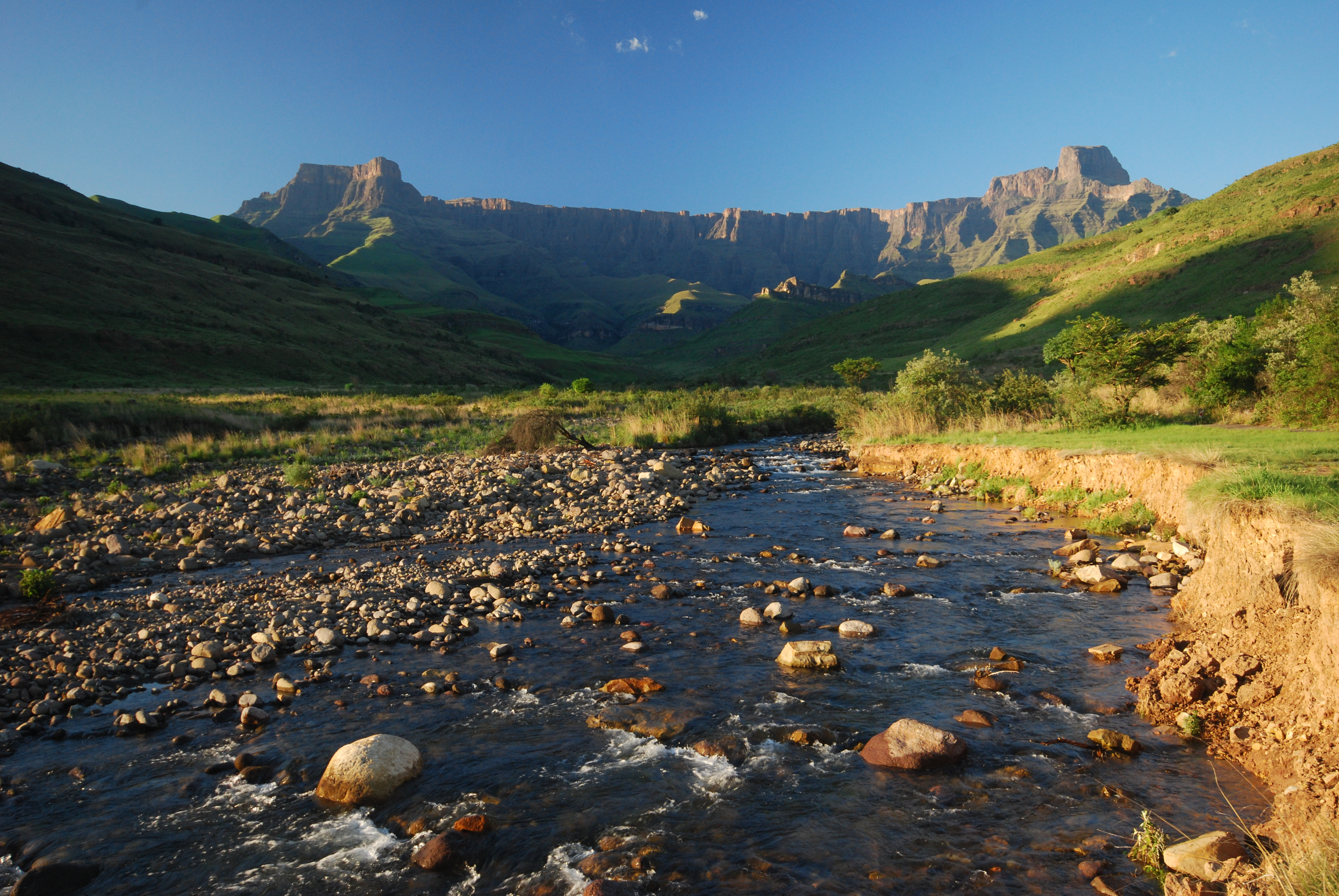 Clear morning looking up-river to the Ampitheatre, Northern Drakensberg Mountain Range,