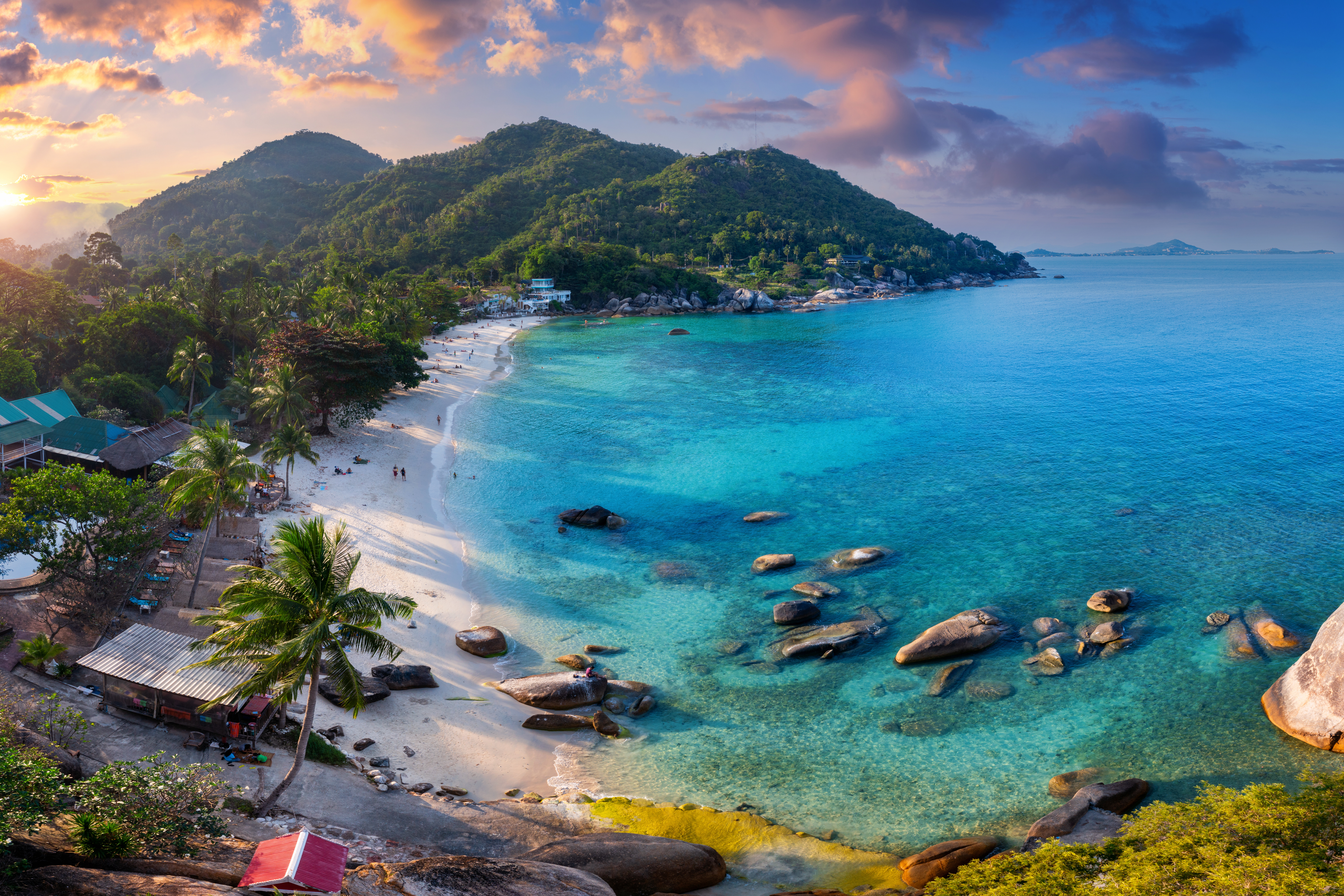 Bay and beach at sunset, stunning colours of the sky and water