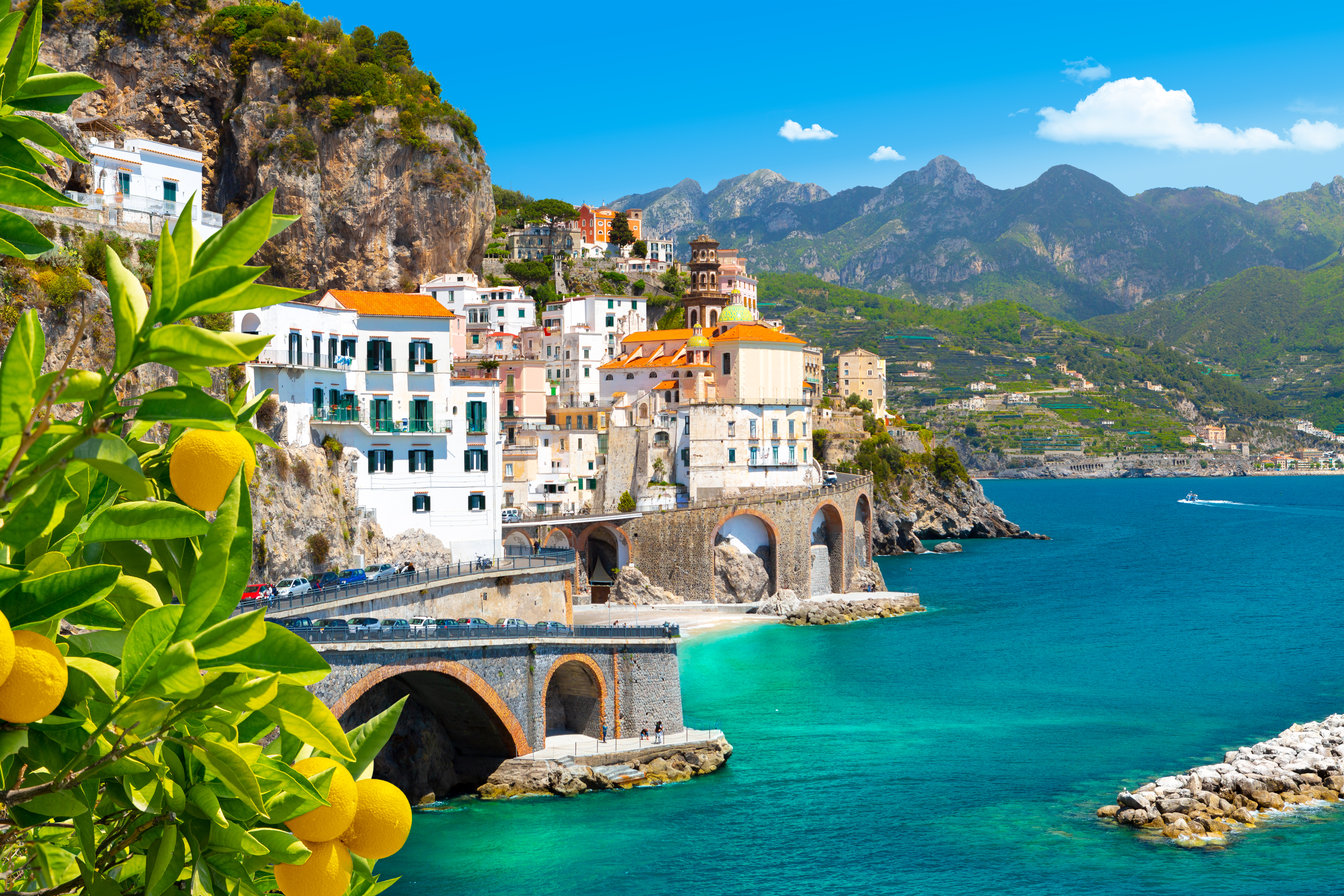 Beautiful view of the Mediterranean coast with lemons in the foreground