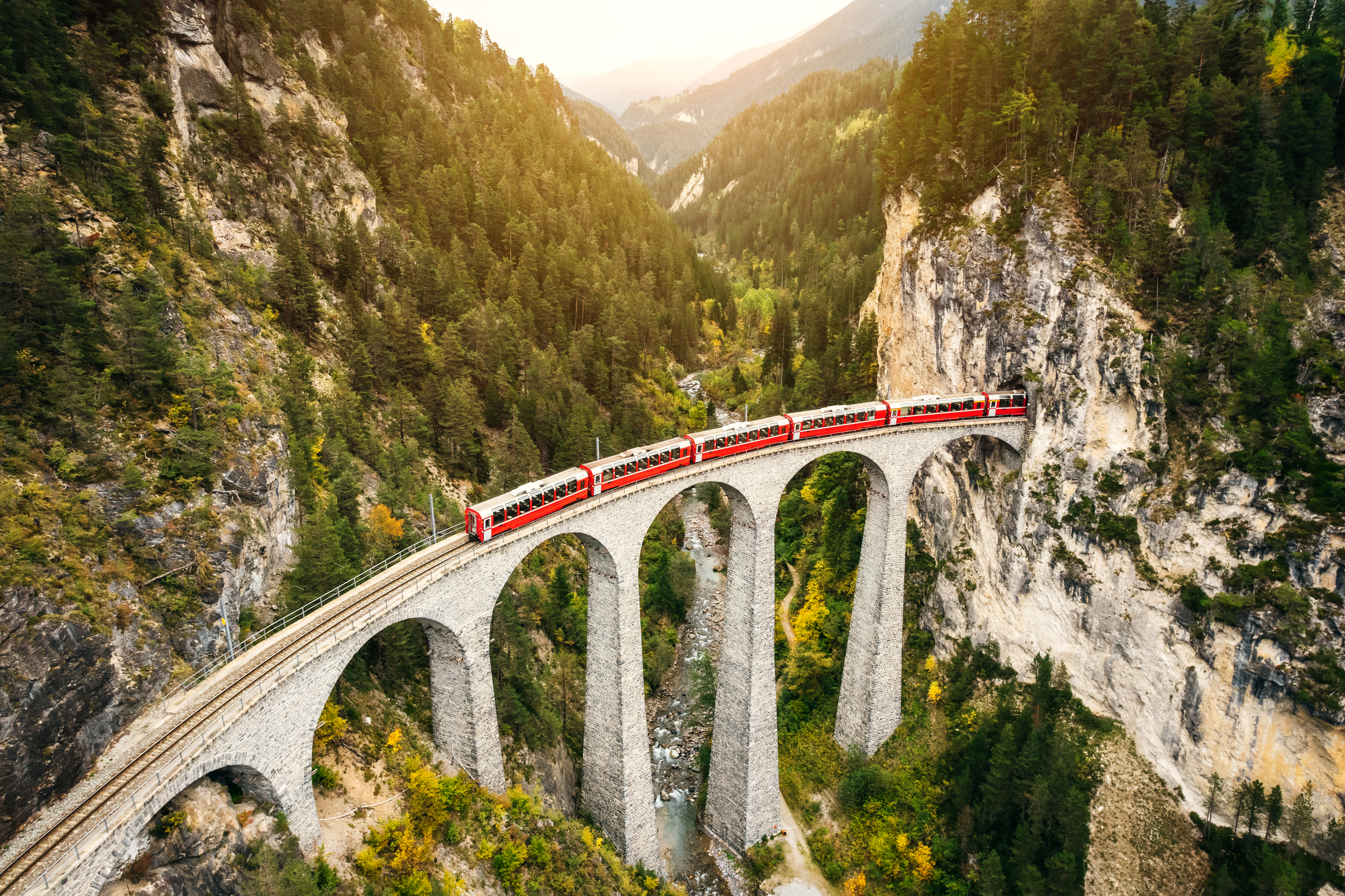 Train crossing Landwasser Viaduct on raethian railway in Filisur – Albula, Graubunden, Switzerland