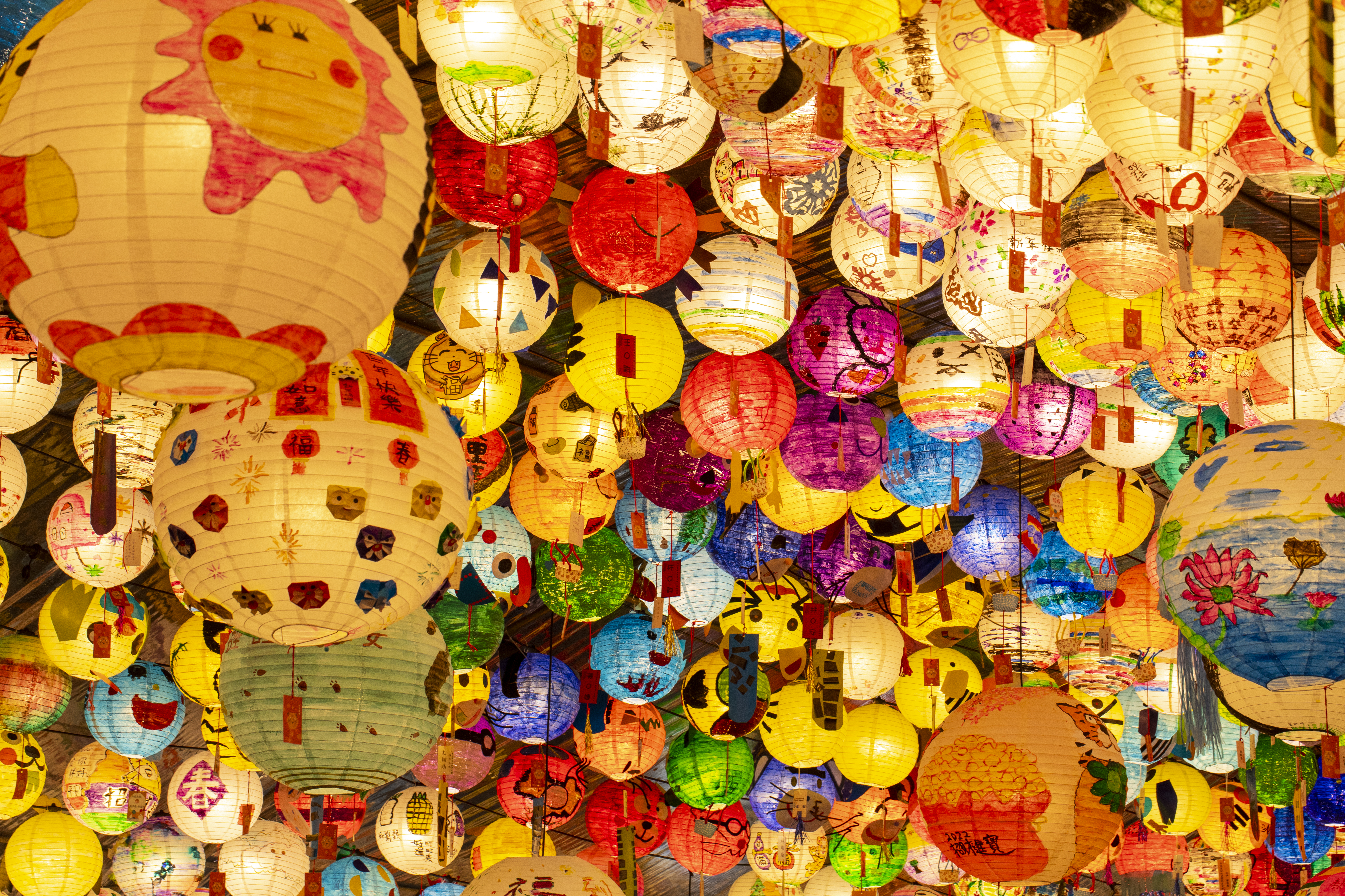 Traditional colorful chinese lanterns cover the ceiling during Taiwan Lantern Festival