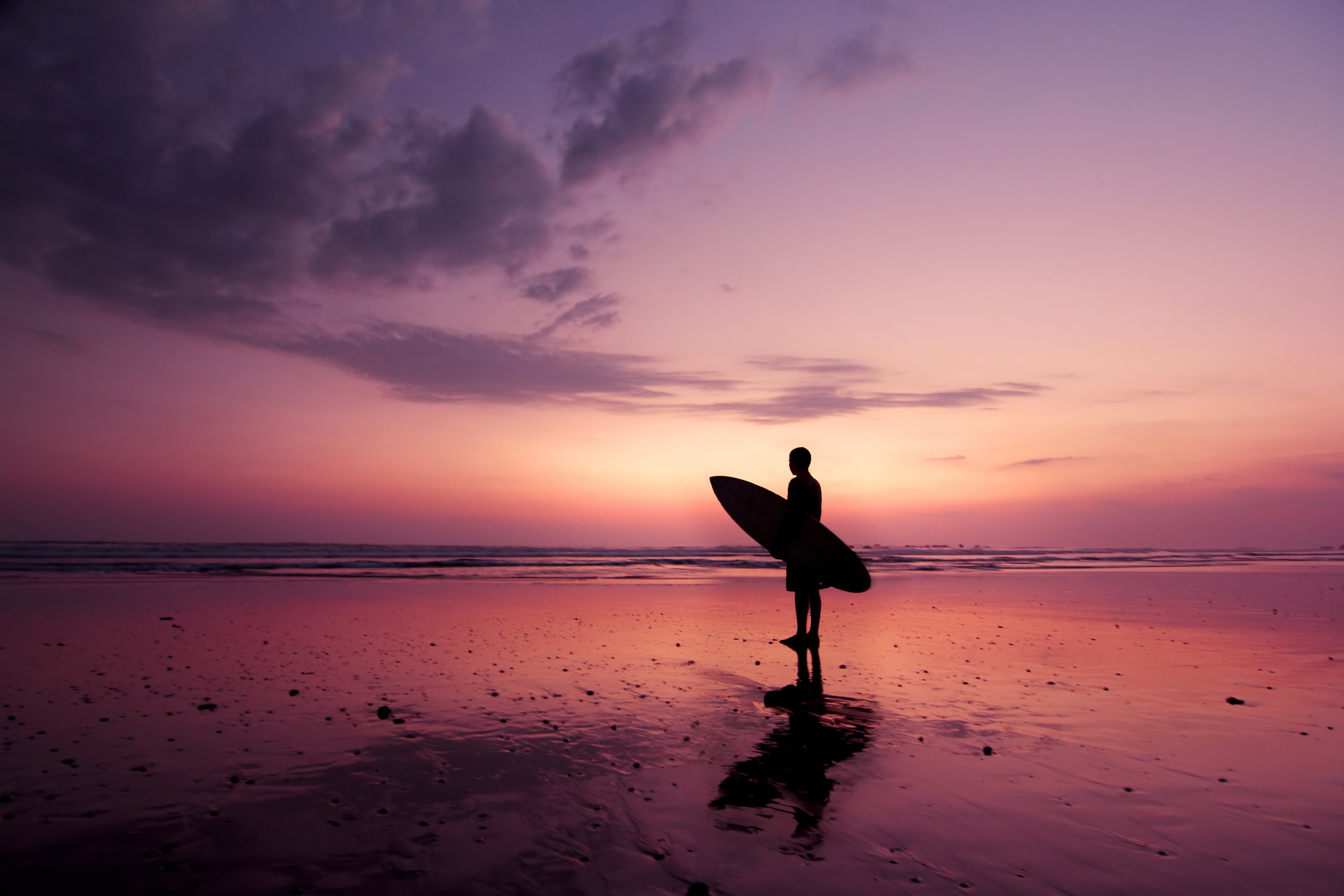 Surfer at sunset