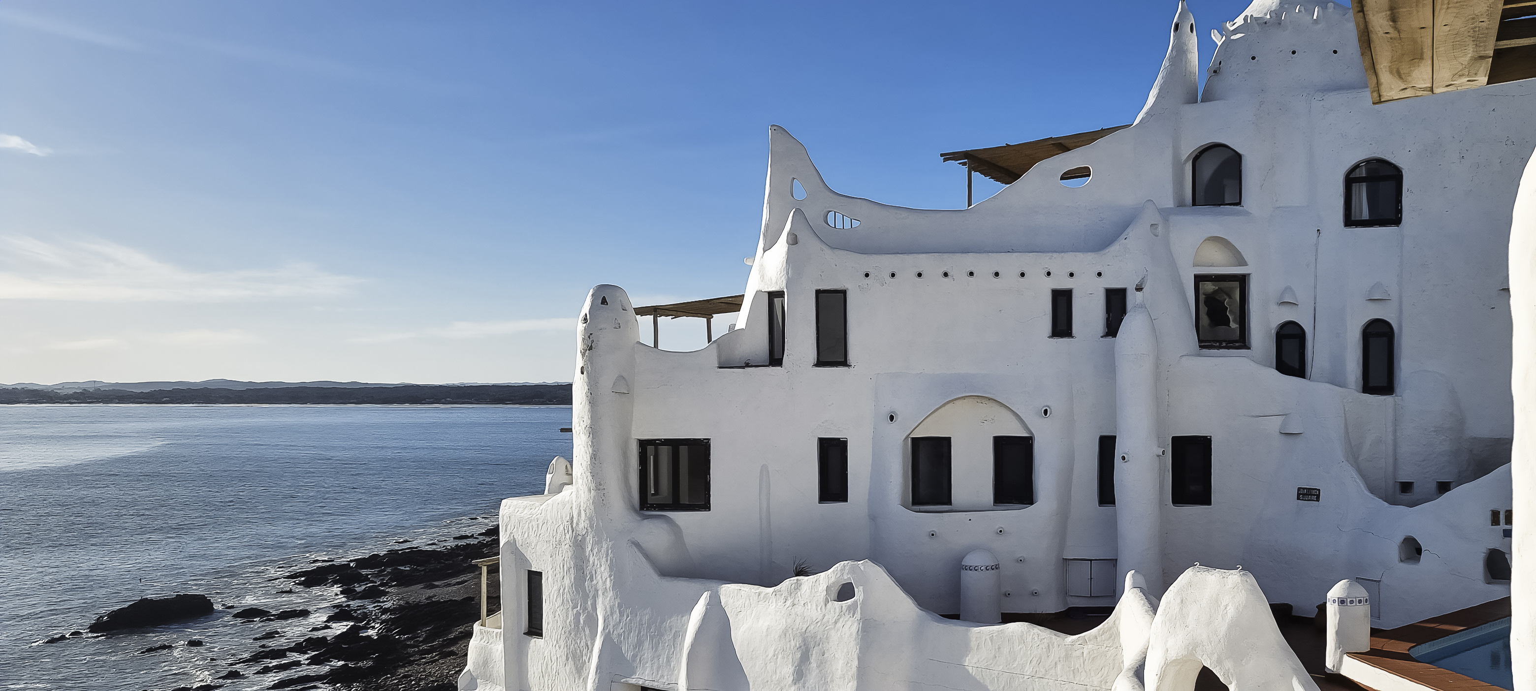 Scenic ocean vista from white building Casapueblo, which took artist Carlos Páez Vilaró 36 years to complete