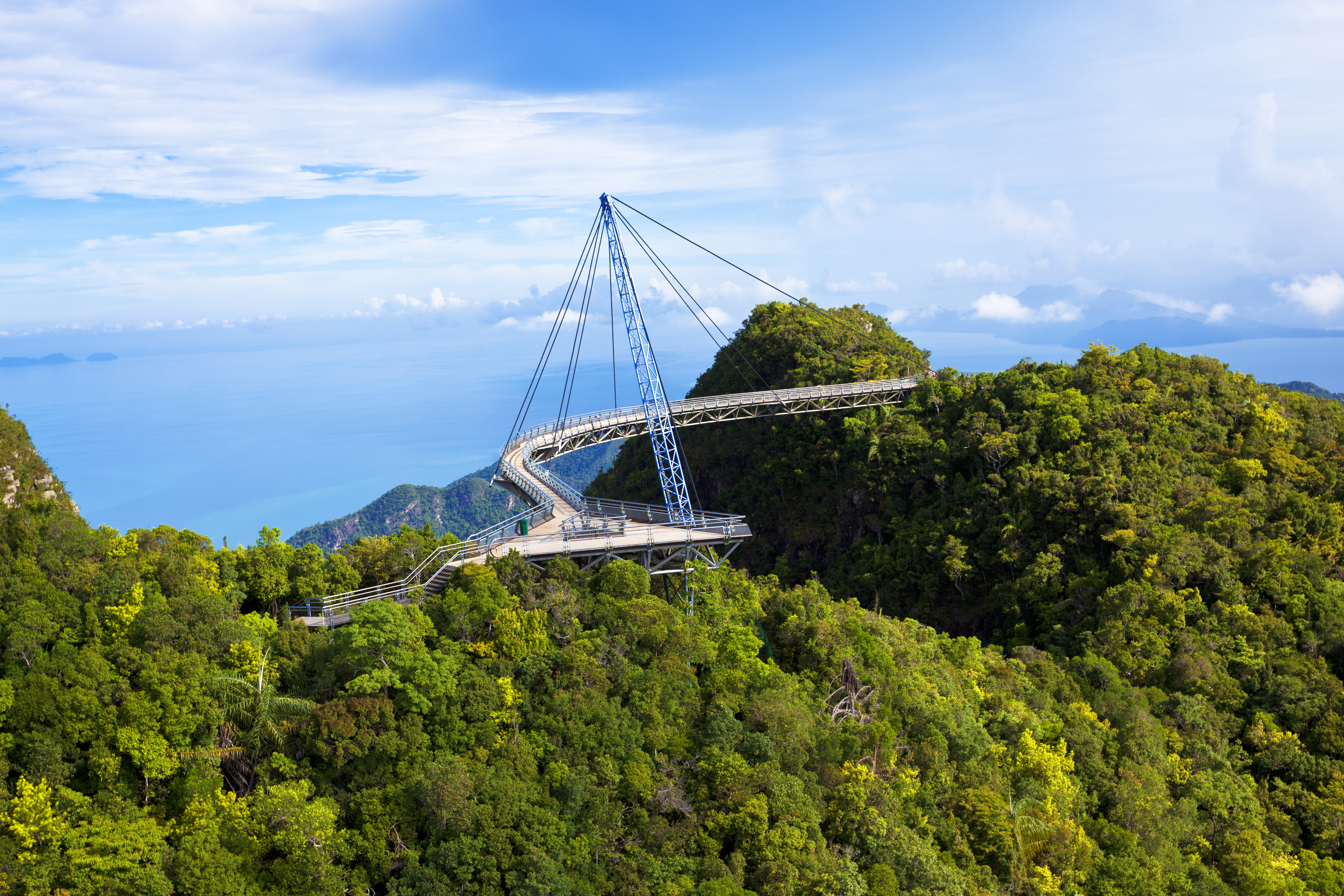 Amazing cable bridge over the tropical rainforest island landscape