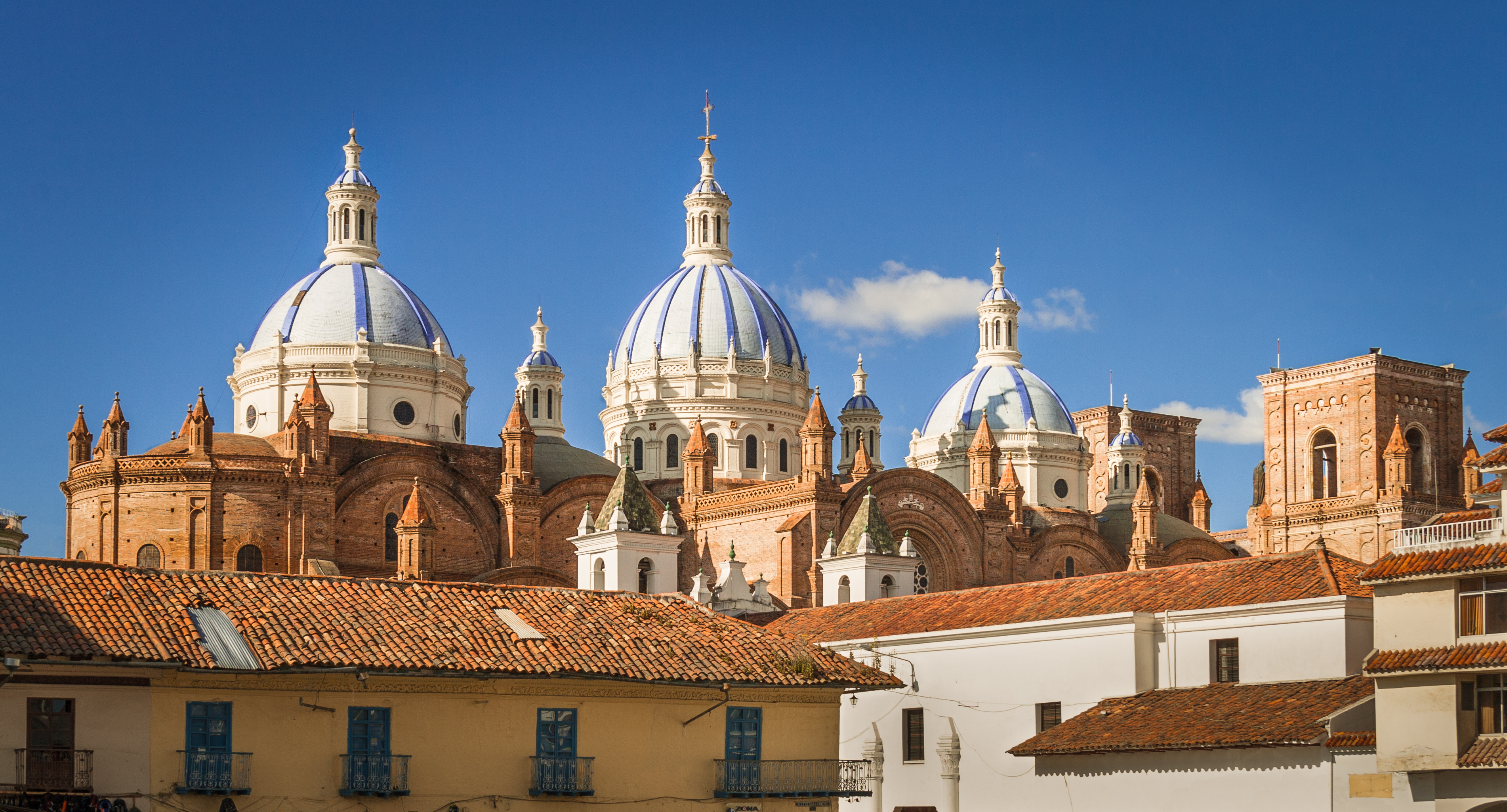 The New Cathedral of Cuenca,featuring series of sky-blue cupolas, is located in front of the Central Plaza in the Parque Calderon