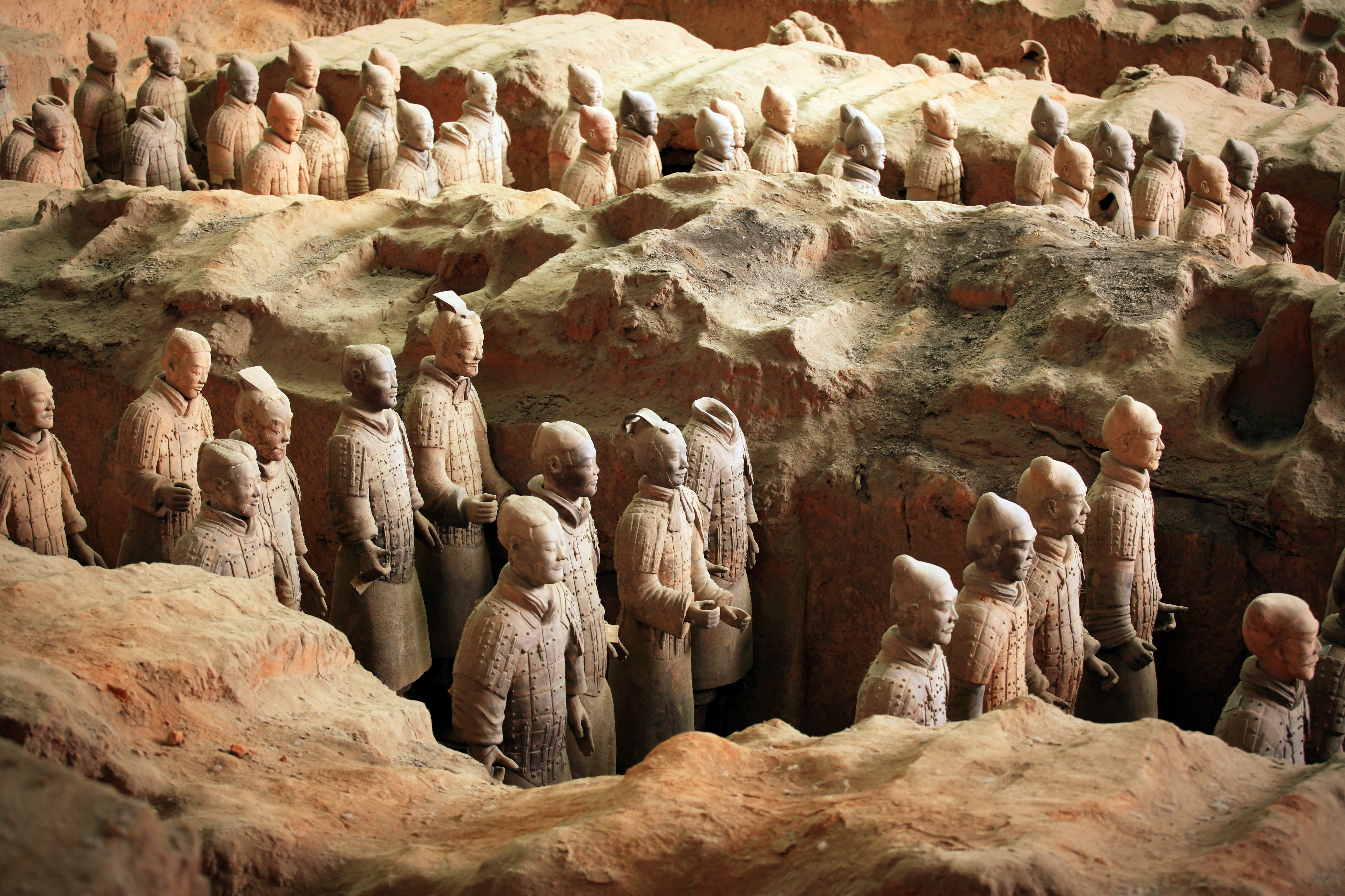 Terra-cotta army soilders, part of an elaborate mausoleum created to accompany the first emperor of China into the afterlife