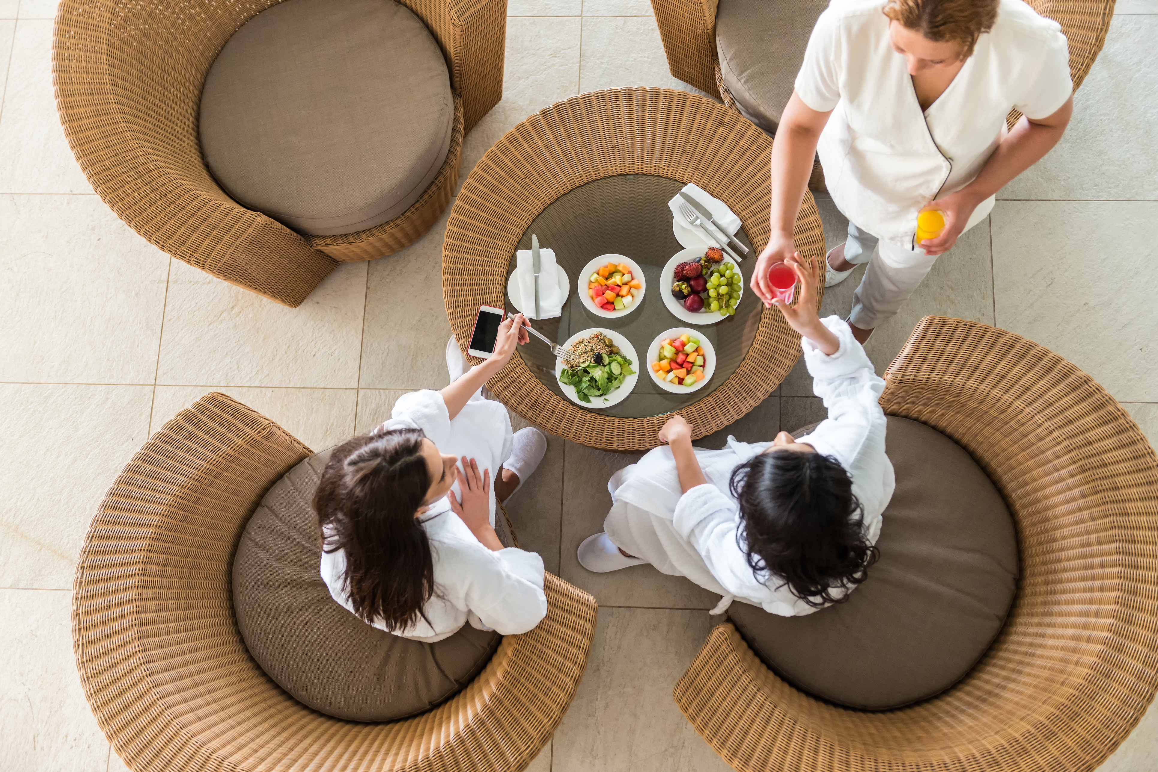 pa Therapist Serving Fresh Juice to Two Women